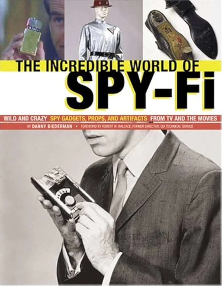 Cover of a book titled 'The Incredible World of Spy-Fi' showing a black and white photo of a man in a suit using a pocket-sized spy device.