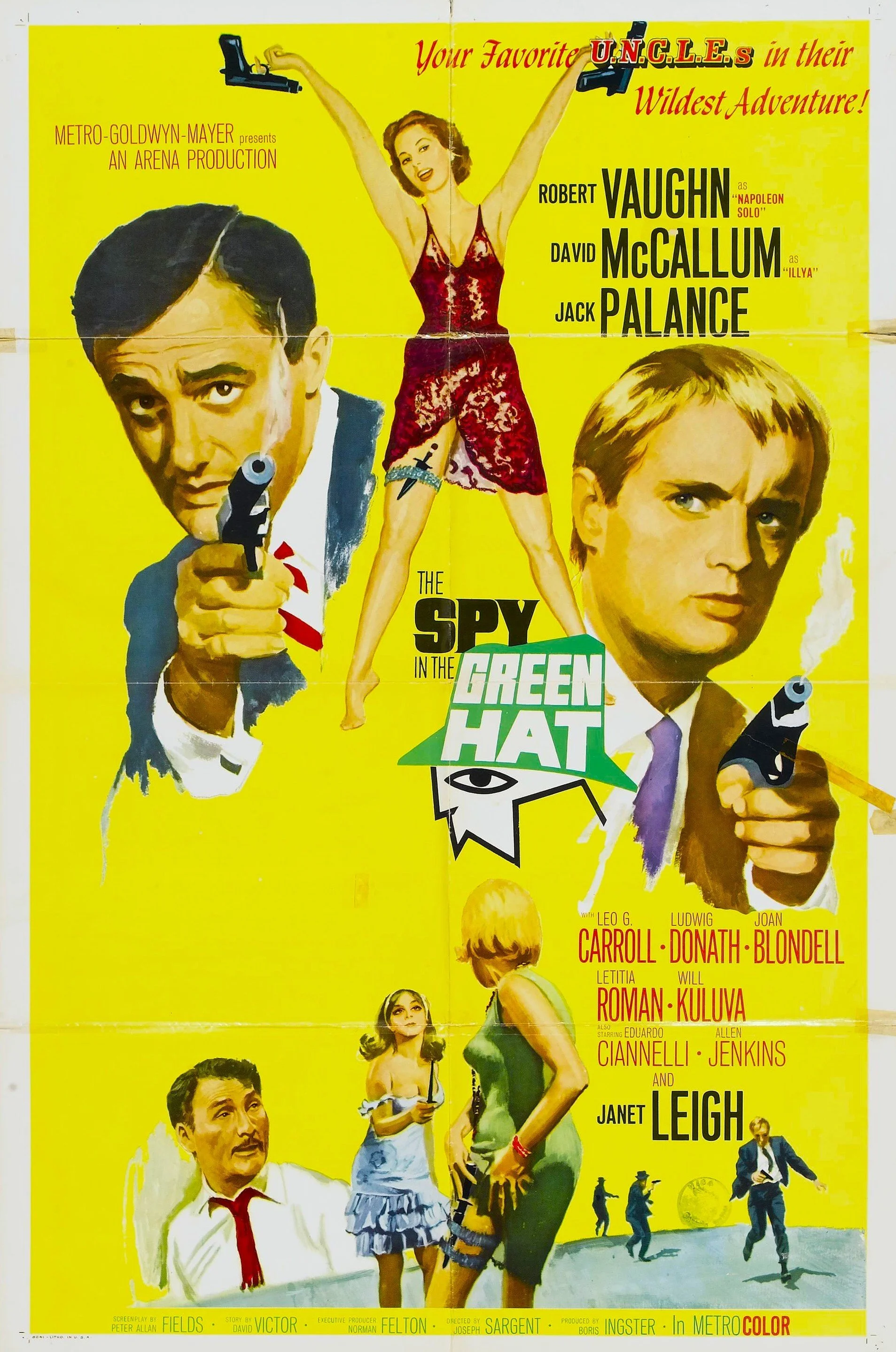 A colorful movie poster for 'The Spy in the Green Hat' featuring illustrated characters, including two men aiming guns, a woman in a red lace dress with arms raised, and other characters in vintage attire, set against a bright yellow background.