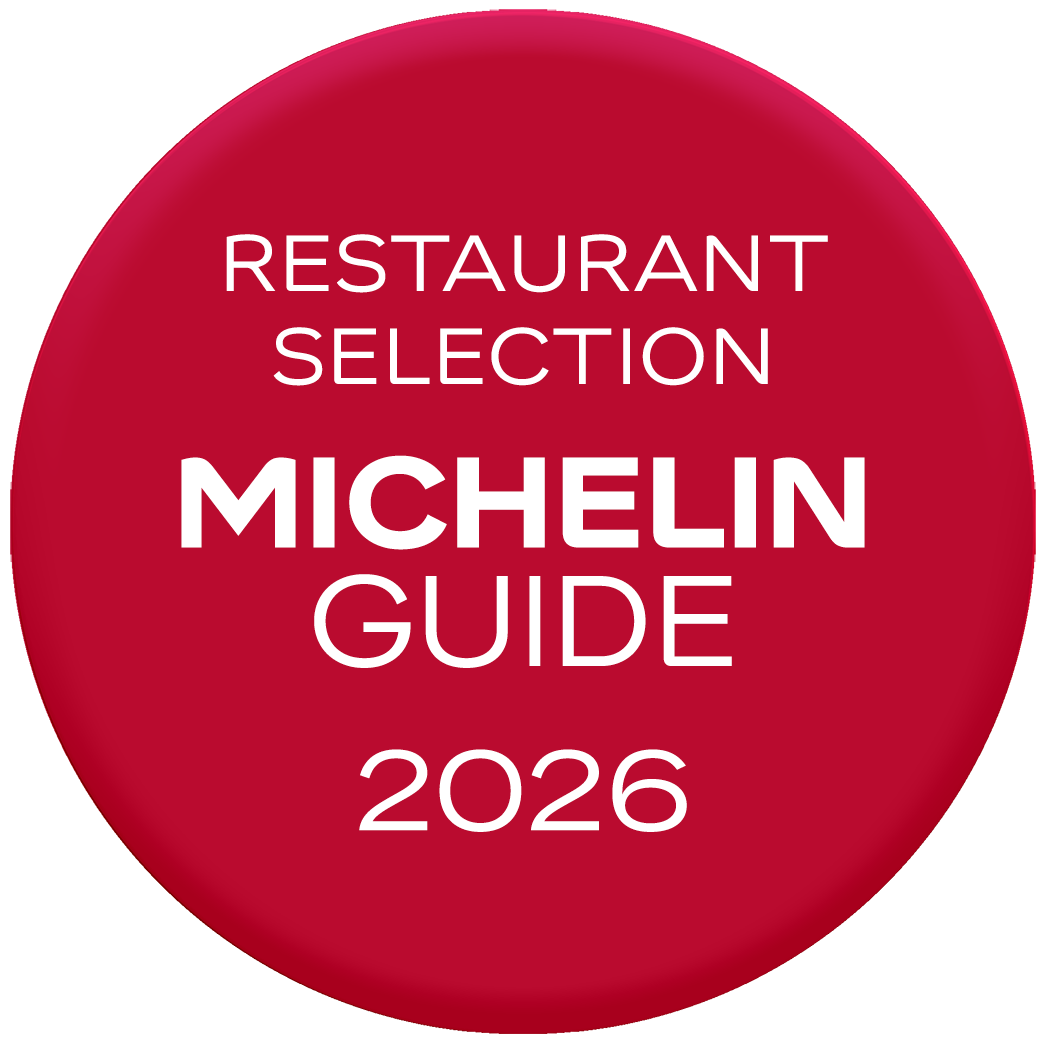 A red circular badge displaying 'Restaurant Selection Michelin Guide 2026' against a red background.