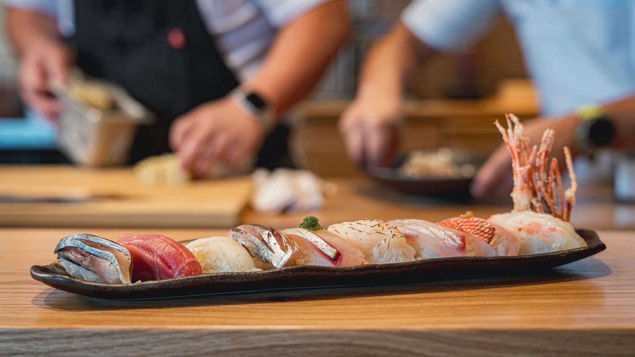 Hand-pressed premium nigiri sushi from the seasonal omakase tasting menu at Kappo Tsan in Orlando, FL.