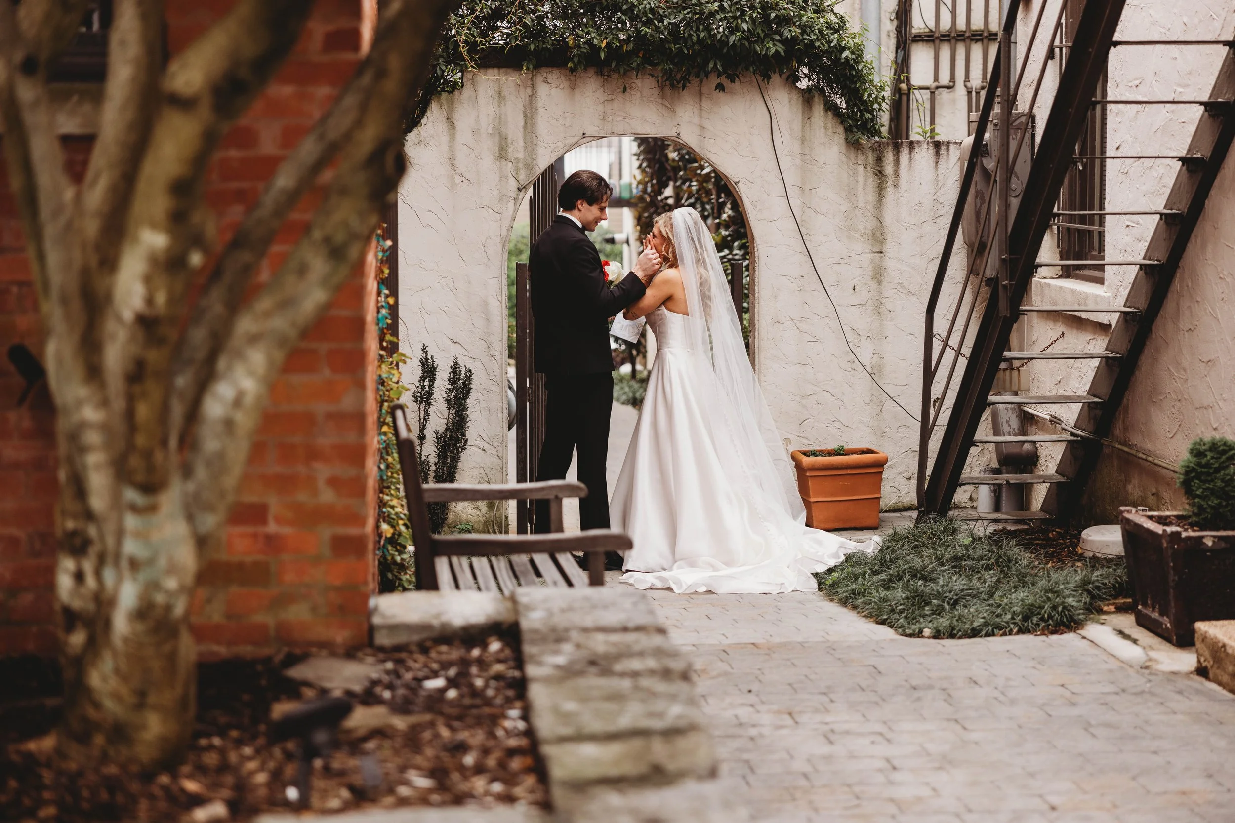 CapturedbyCairnsPhotography Makala and Chasen Wedding Bluff View Art District-100.jpg