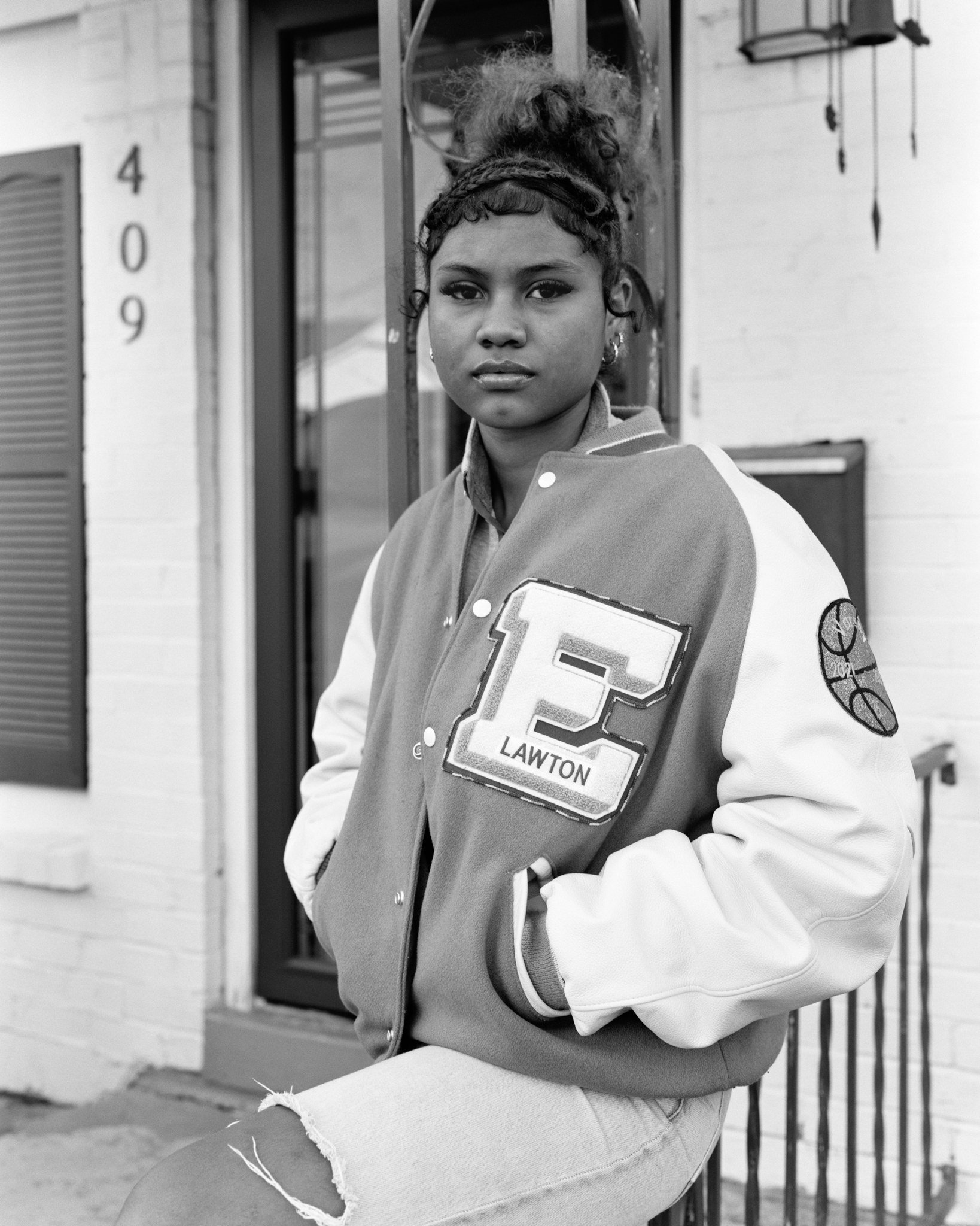  Greta Alexandra-Parker,  Cousin in her Letterman Jacket (Lawton, Oklahoma) , 2025. 