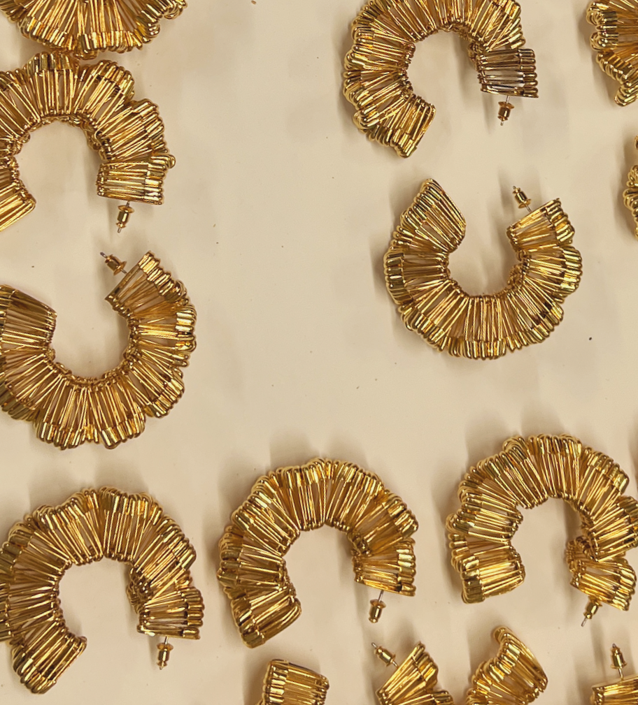 Oversaw one of my first jewelry productions, the Safety Pin Jewelry Line, hand creating the entire line from start to finish in house.