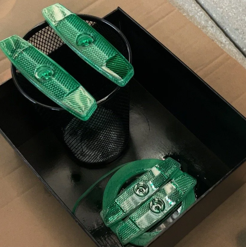 Experimented with color for the car light earrings by spray-painting bike lights, helping build a broader palette for the collection.