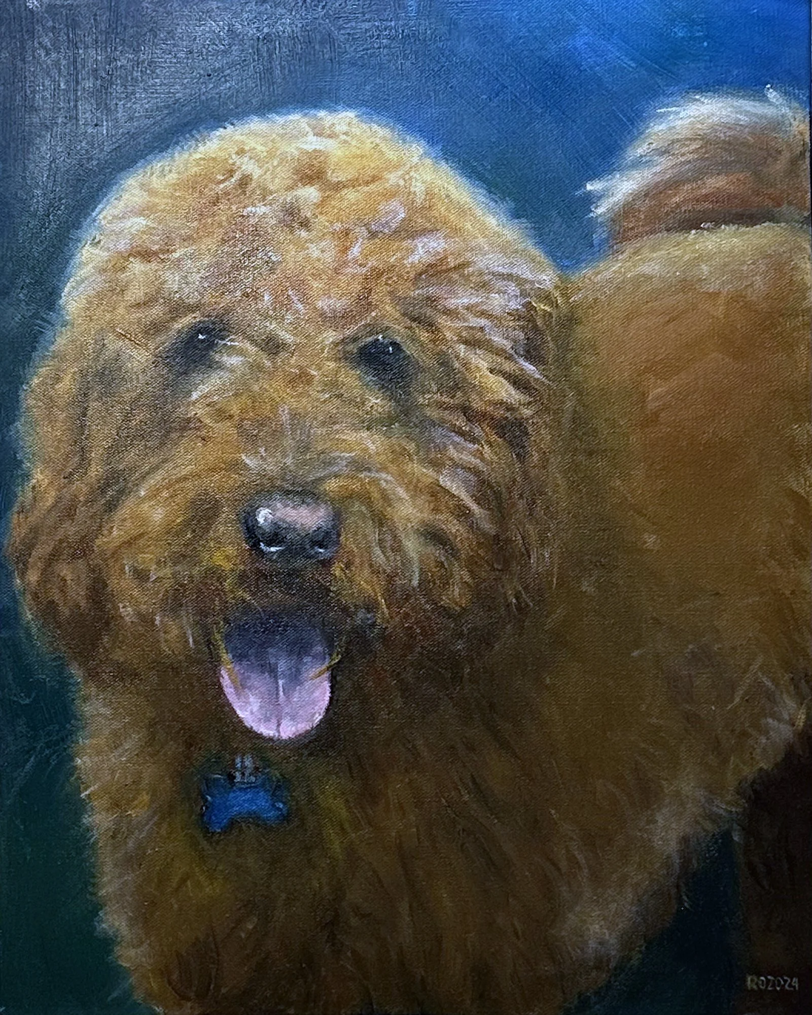 This oil painting is of a Goldendoodle with a happy expression, tongue out, with a blue collar, against a blue background.