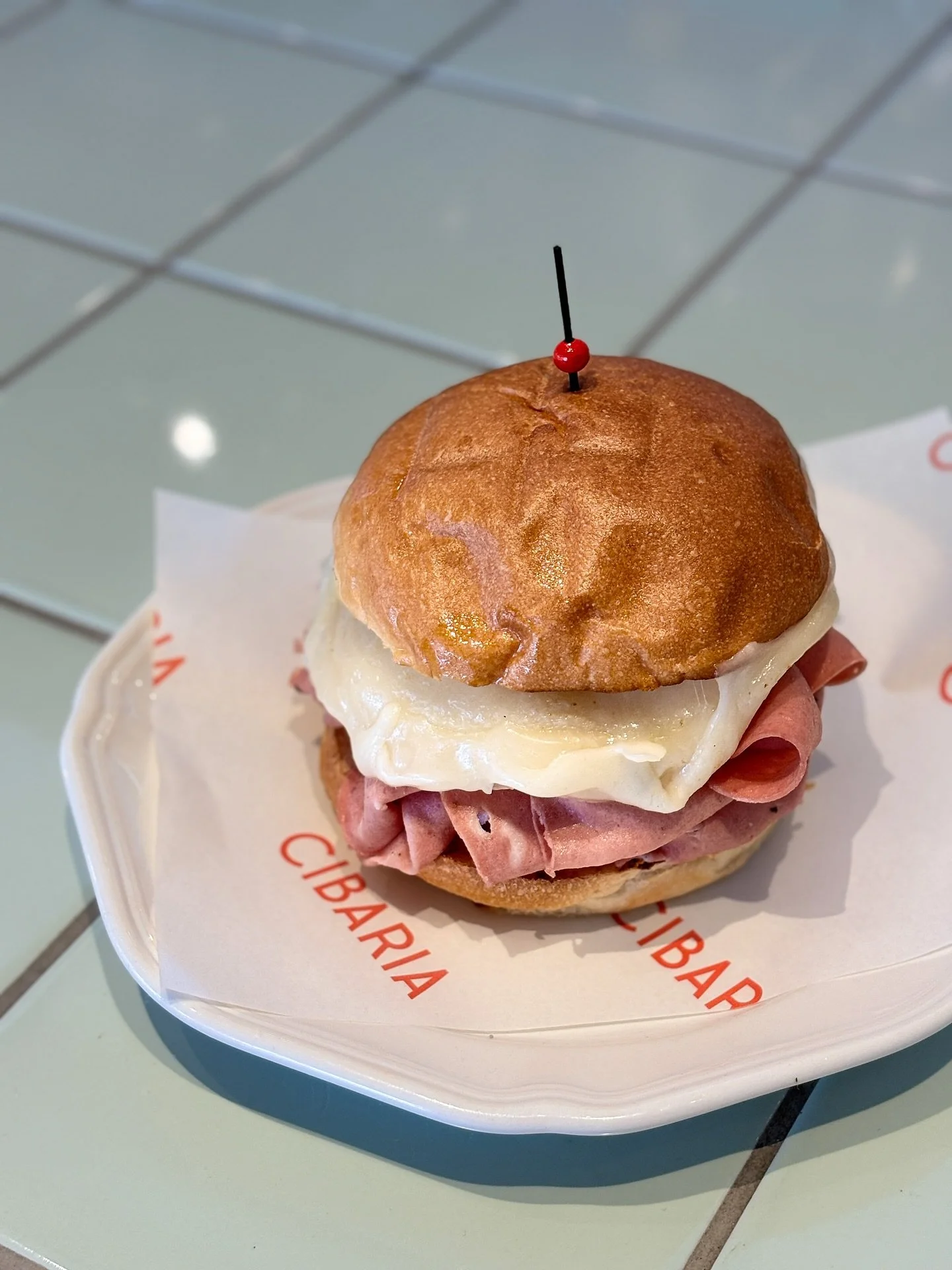 Long weekends are made for late starts and cheesy paninis worth getting out of bed for. 

Made with mortadella, melted Provolone Valpadana PDO, fennel and lemon mayo stacked in a brioche bun 🤤 

Best enjoyed seaside. Join us, we are open today. 

@o