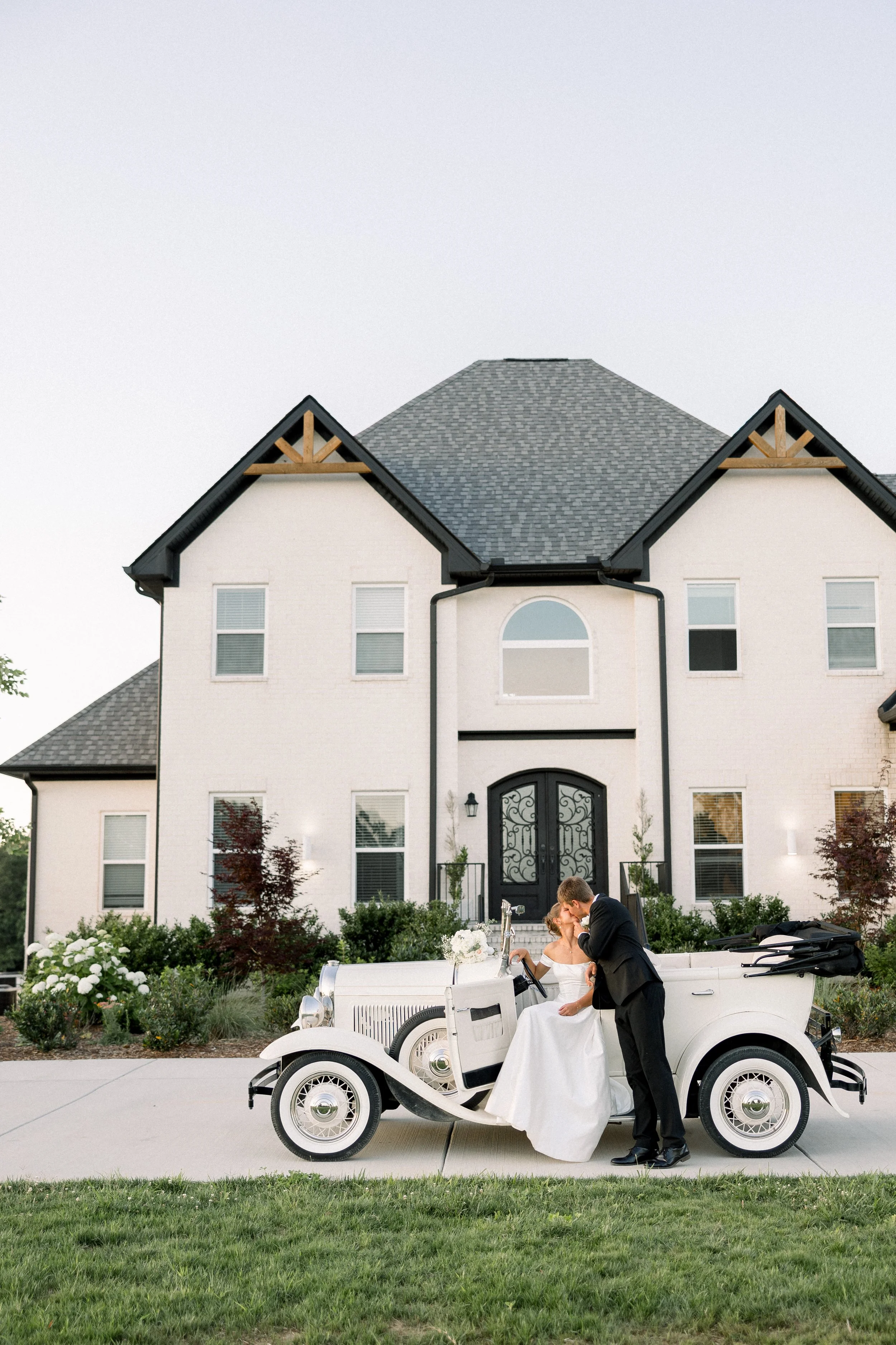 A bride and groom at an outdoor wedding captured by Middle Tennessee Wedding Photographers at Howe Farms Wine into Water