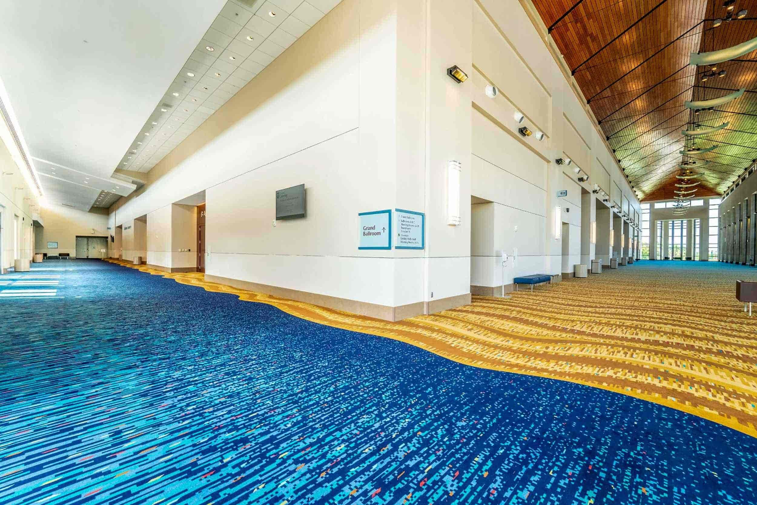 80/20 wool Axminster carpet installed in high-traffic convention center corridor