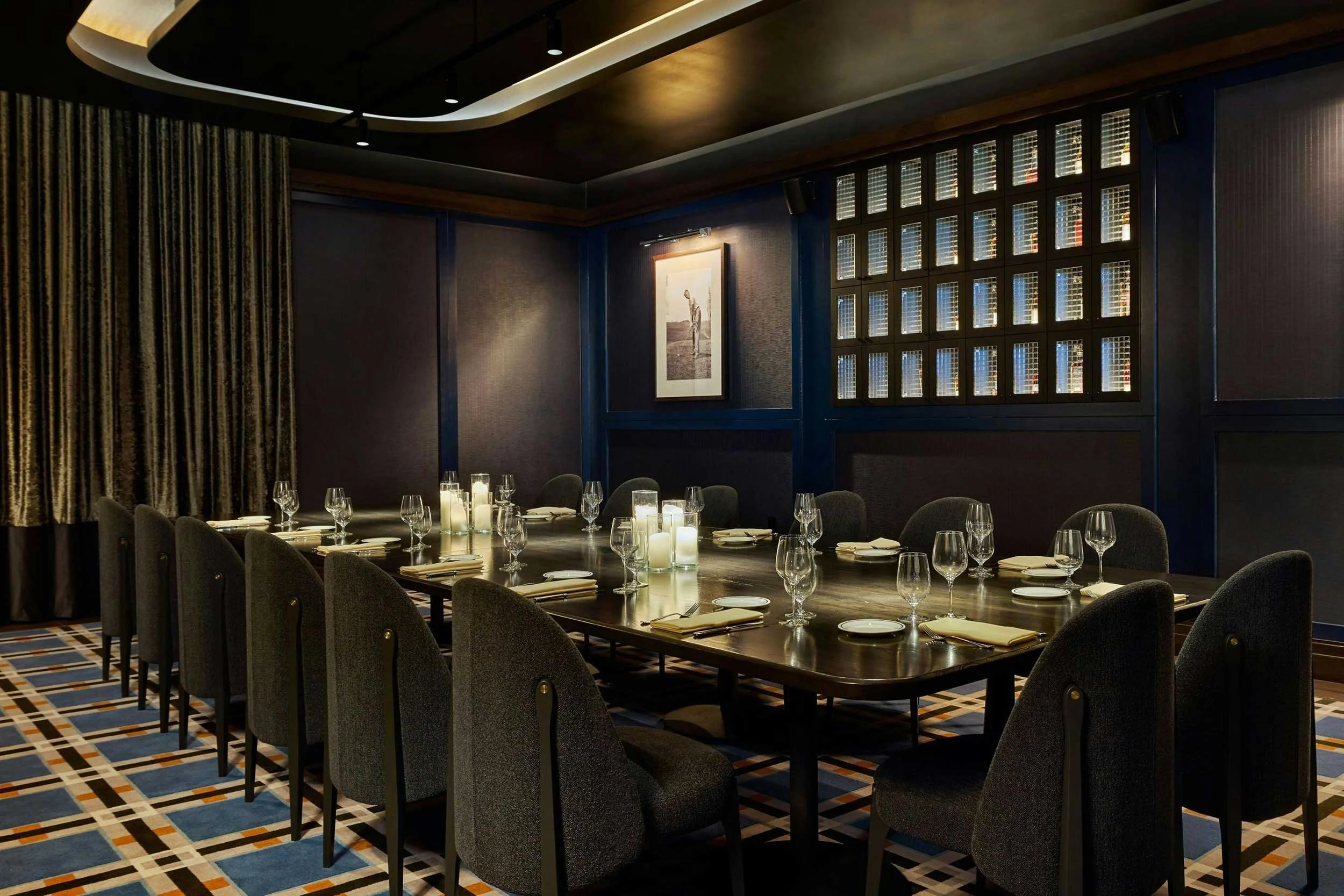 Private dining room with custom woven Axminster carpet at Boilerhouse Prime Steakhouse