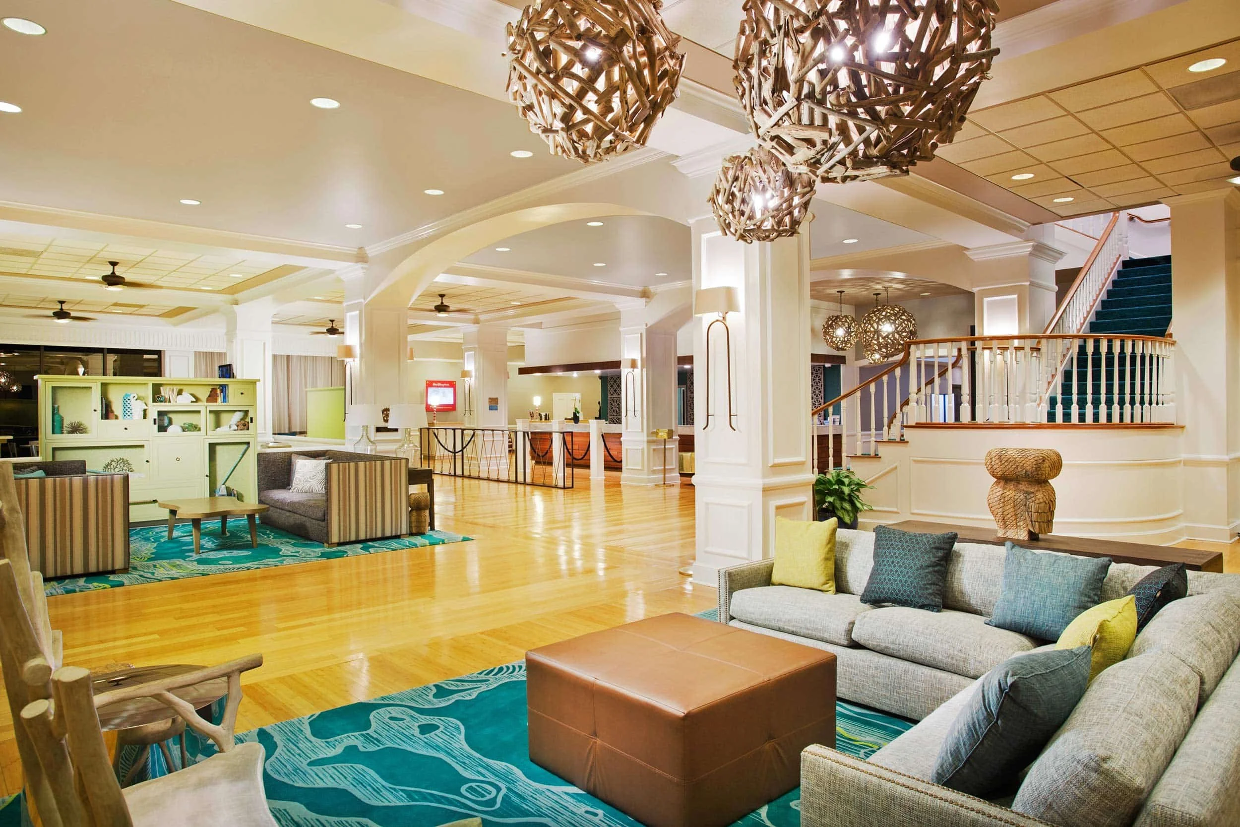 Custom hand-tufted rug installed in a high-traffic hotel lobby