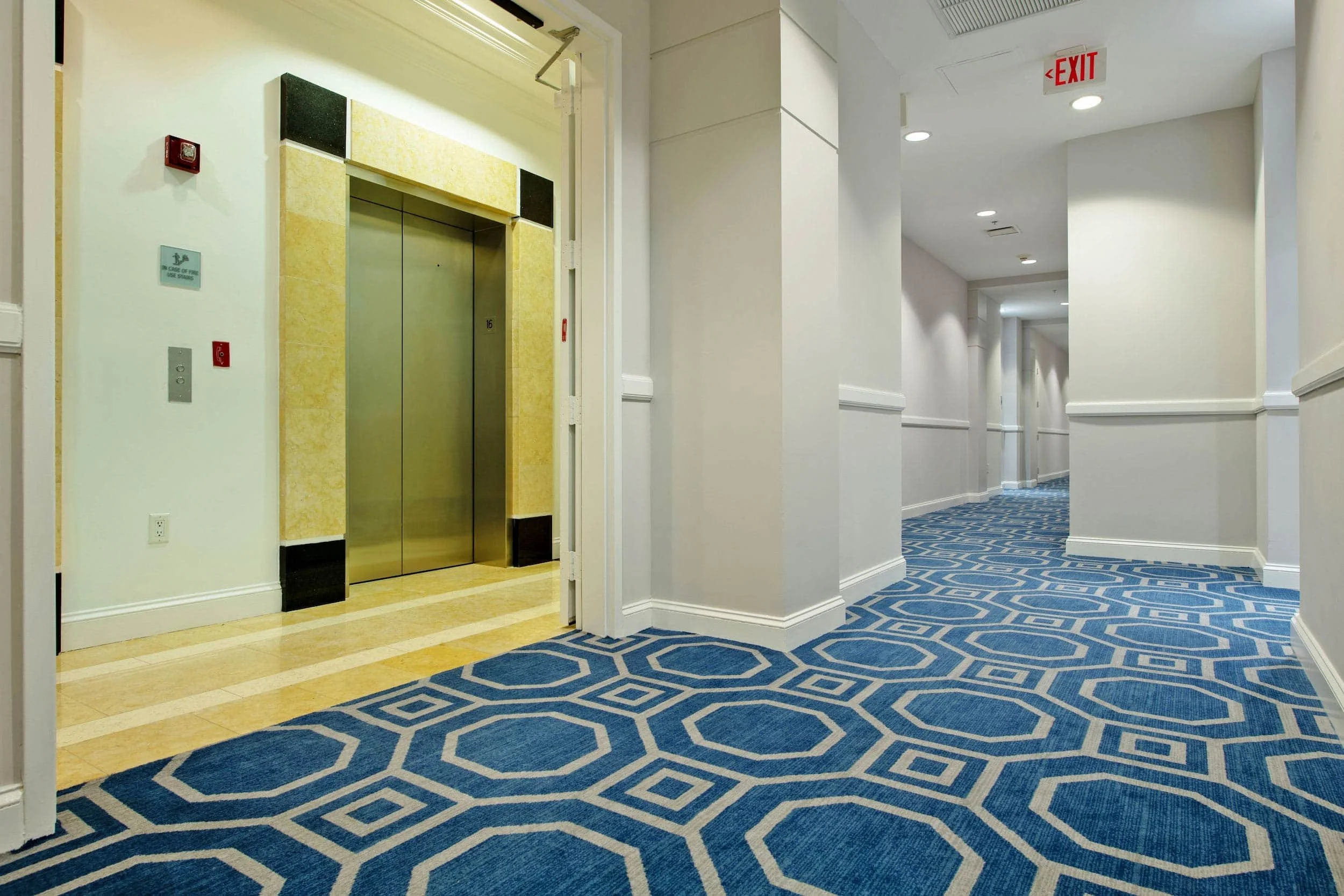 Custom carpet installation in a hospitality interior comparing commercial carpet applications