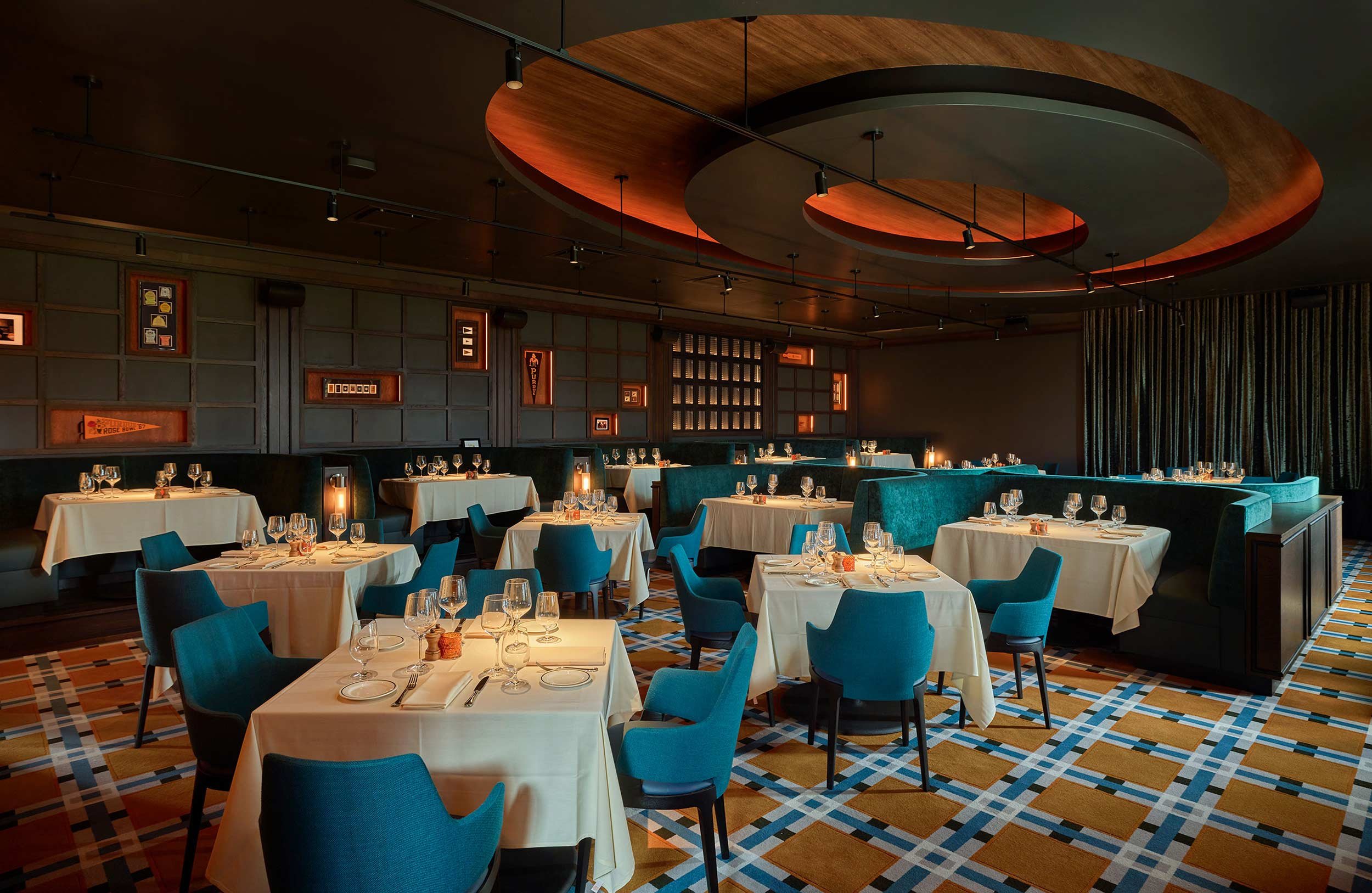 Custom woven Axminster carpet in the main dining room at Boilerhouse Prime Steakhouse