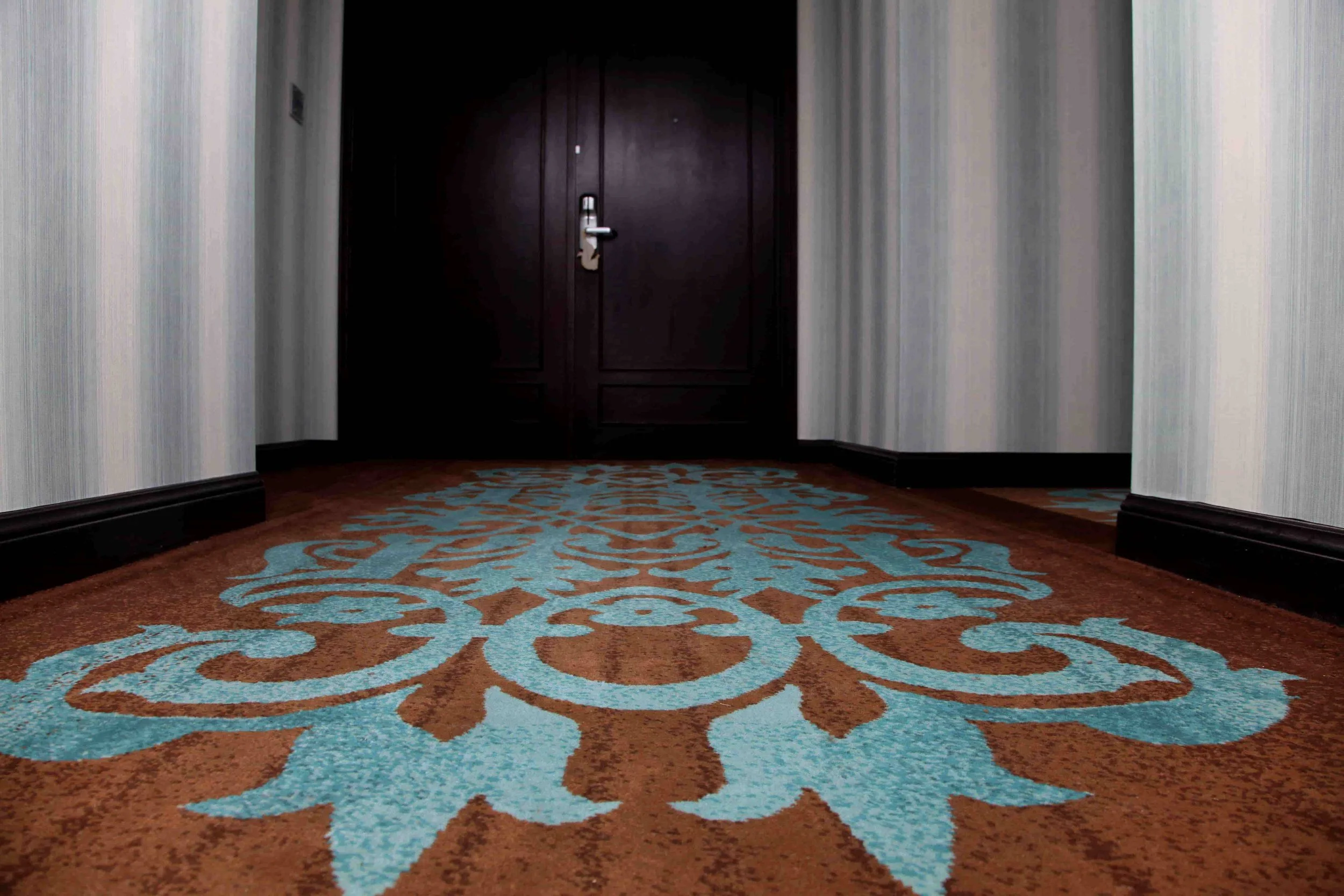 Custom hotel carpet pattern with layered movement and texture