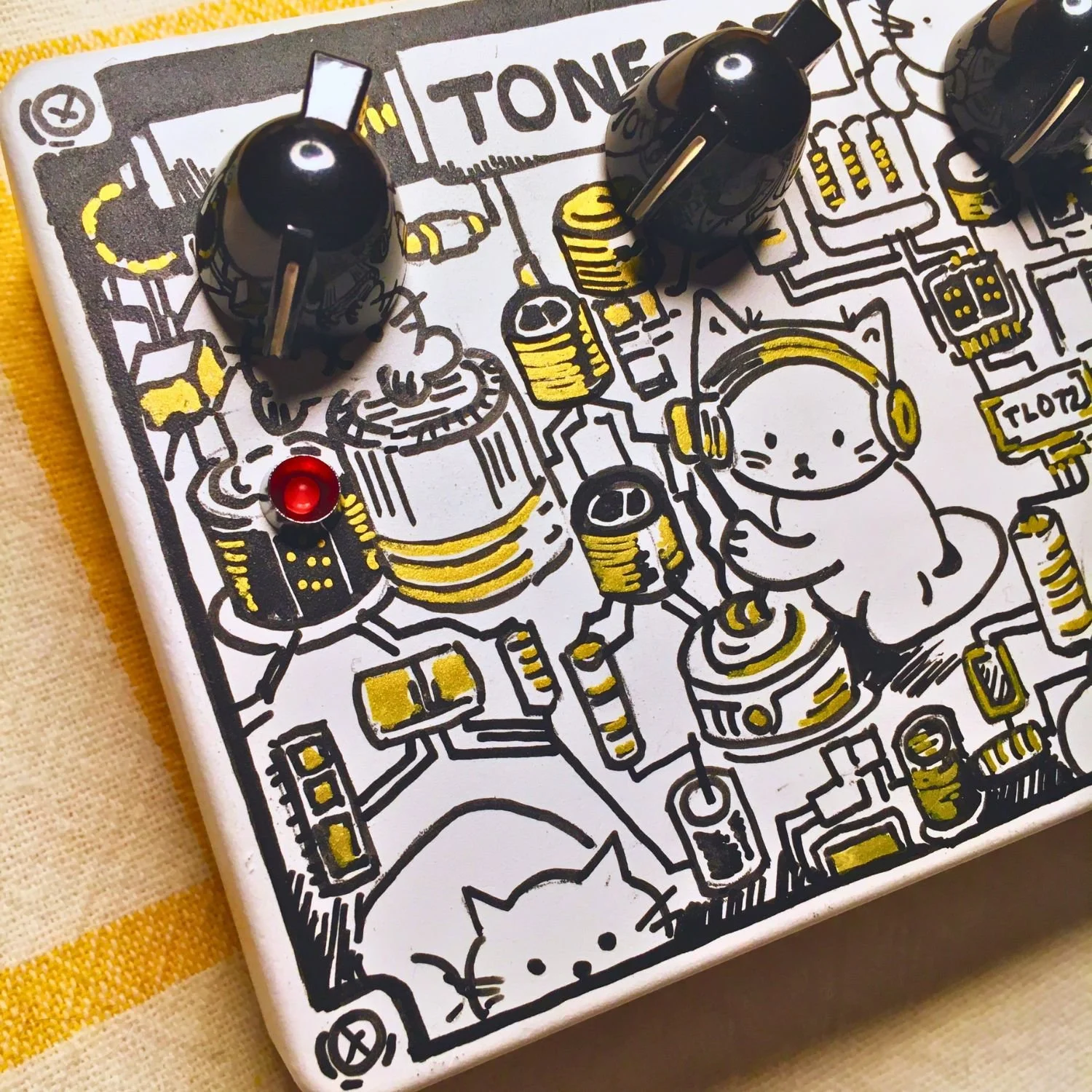 Custom Tonecat Internal Affairs Klon-style overdrive pedal with hand-finished boutique enclosure artwork, Série Atelier effects pedal