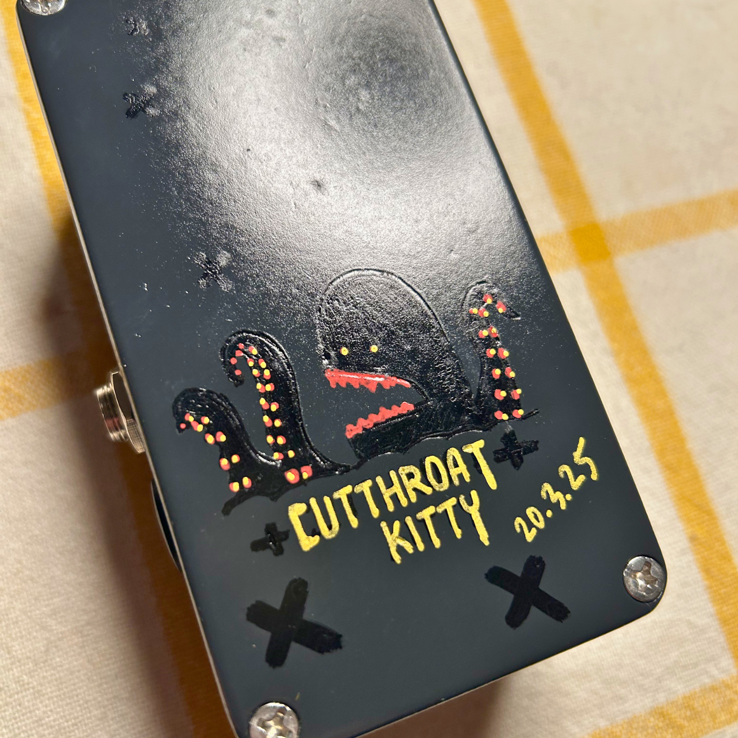 Cutthroat-Kitty-Distortion-back-side.png