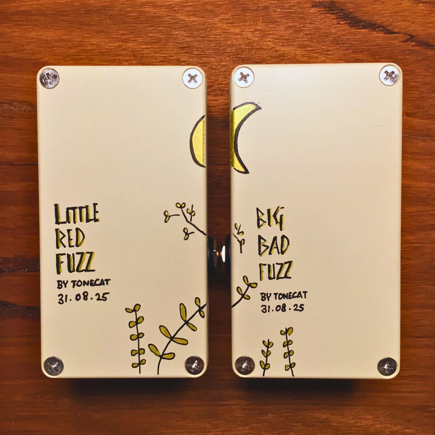 Pair of custom Tonecat fuzz pedals, Little Red and Big Bad Fuzz - matching backplate design