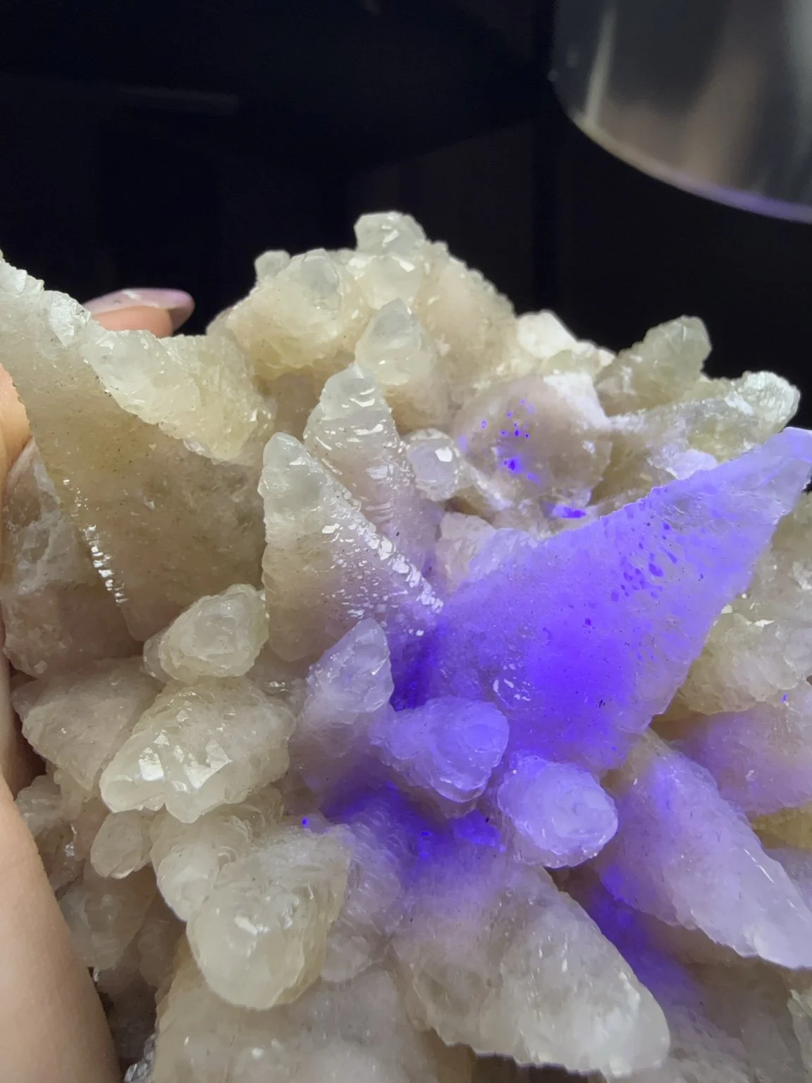 Detail of the feathered crystal formations in the dogtooth pink calcite specimen