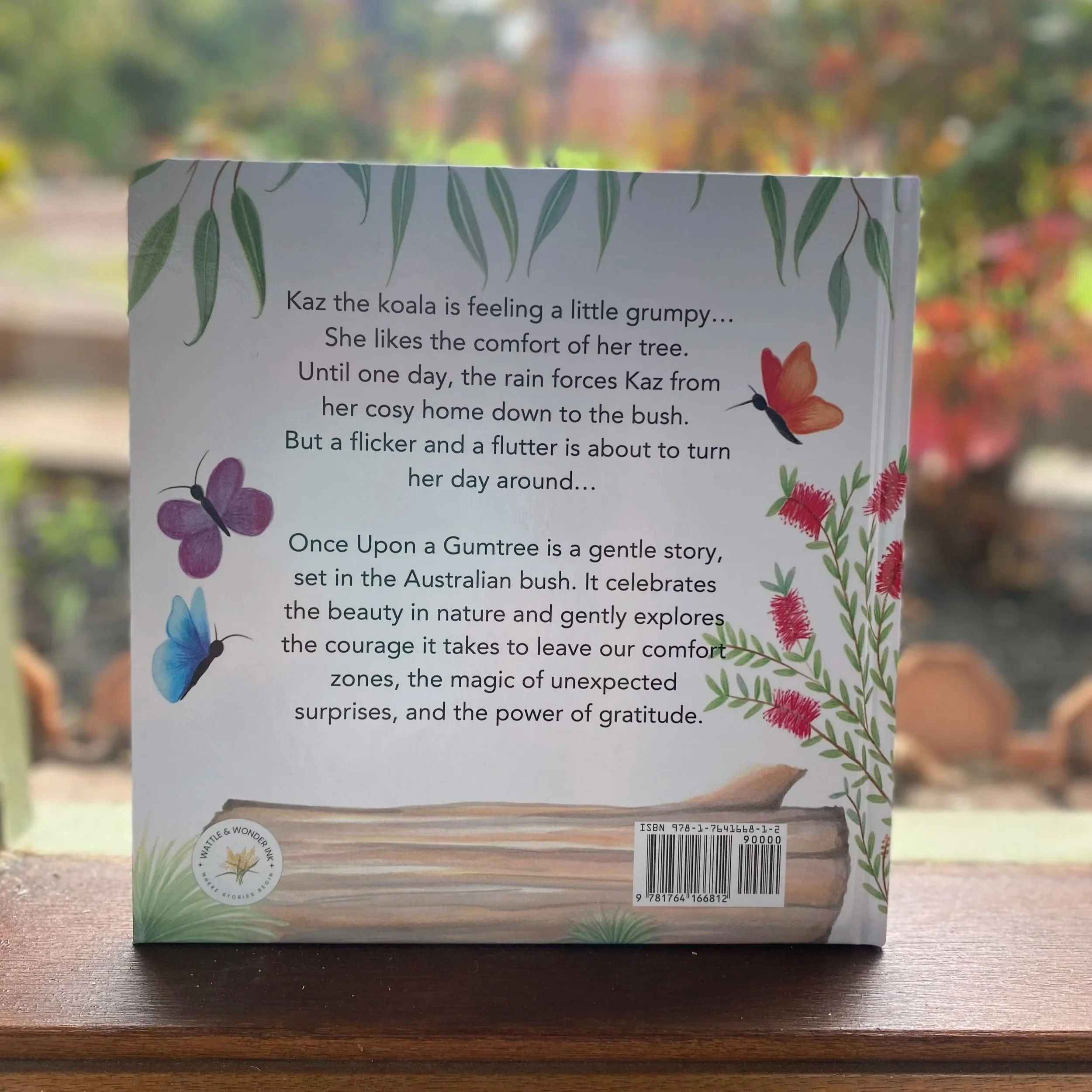Back cover of Once Upon a Gumtree showing the book blurb and illustrated butterflies.