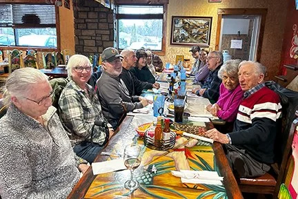 stroke survivors and caregivers at dinner at a Mexican restaurant