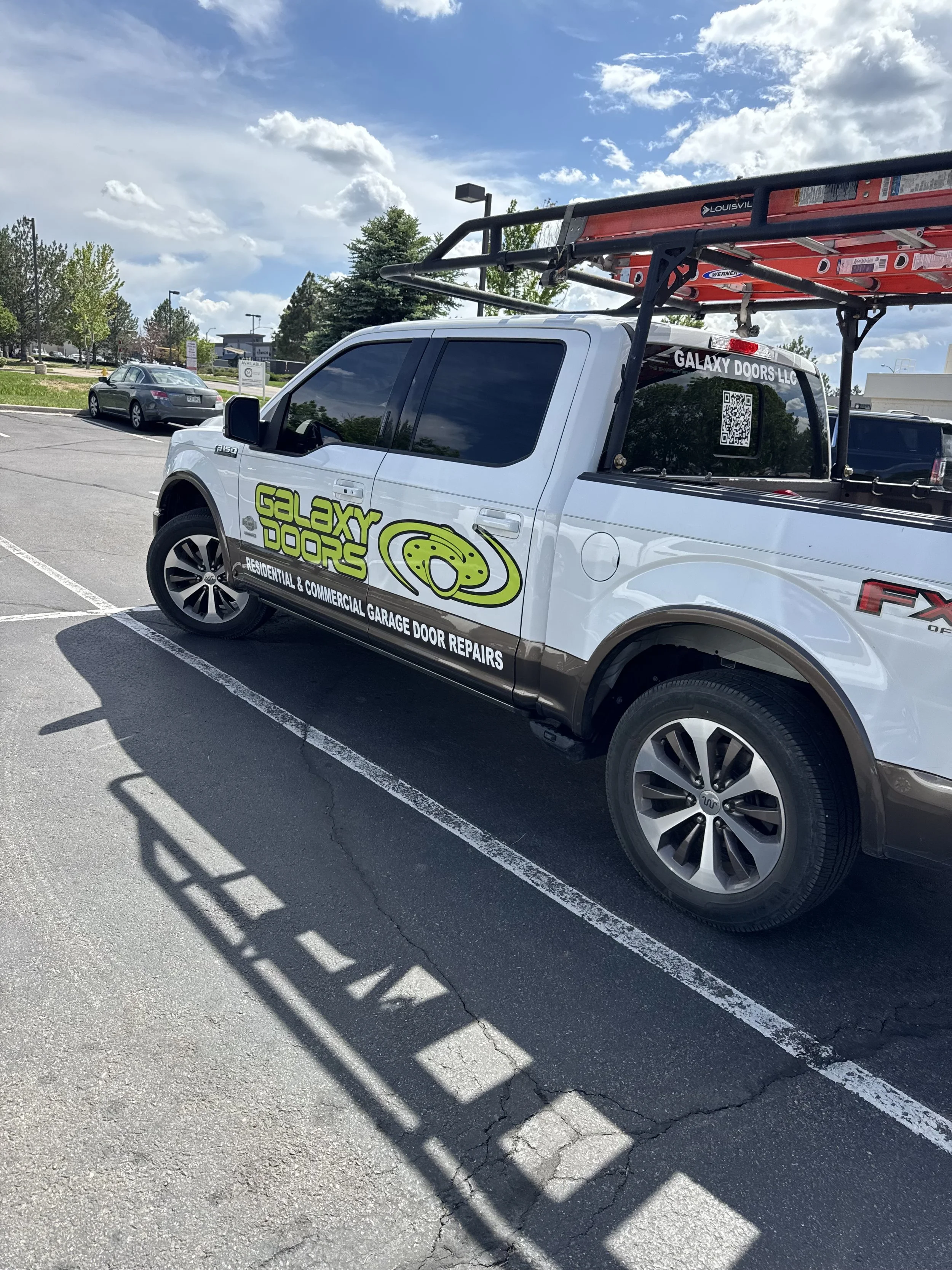Galaxy Doors service truck providing residential and commercial garage door repair in South Denver, Colorado