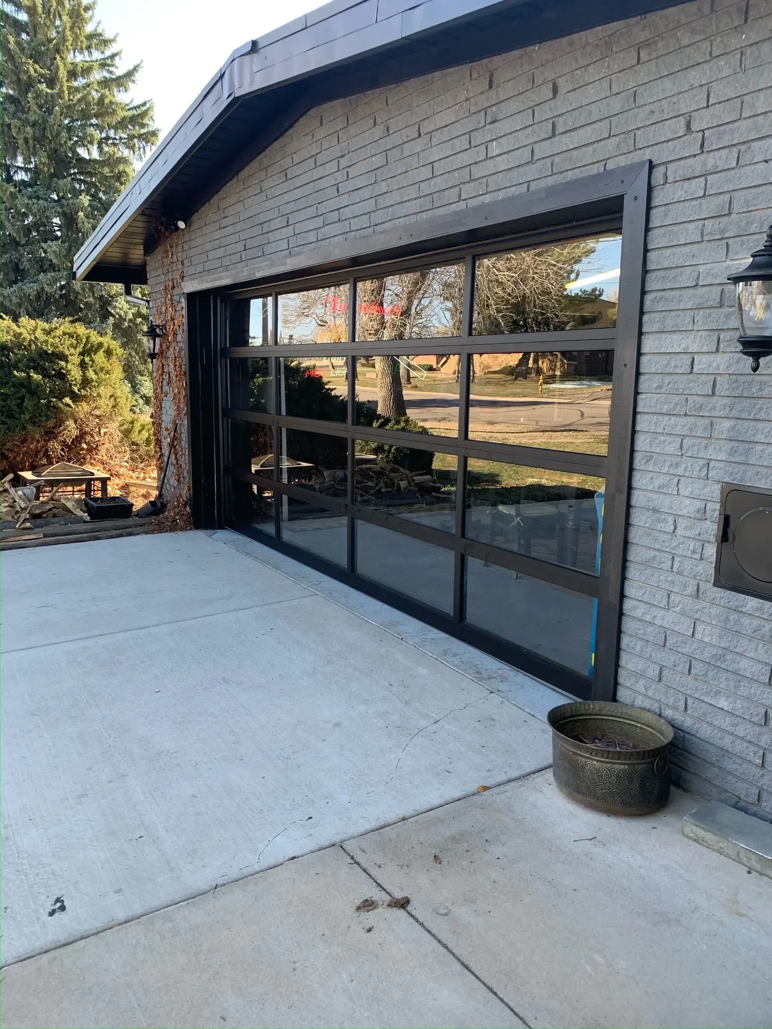 Full-view glass garage door installed by Galaxy Doors in South Denver, Colorado