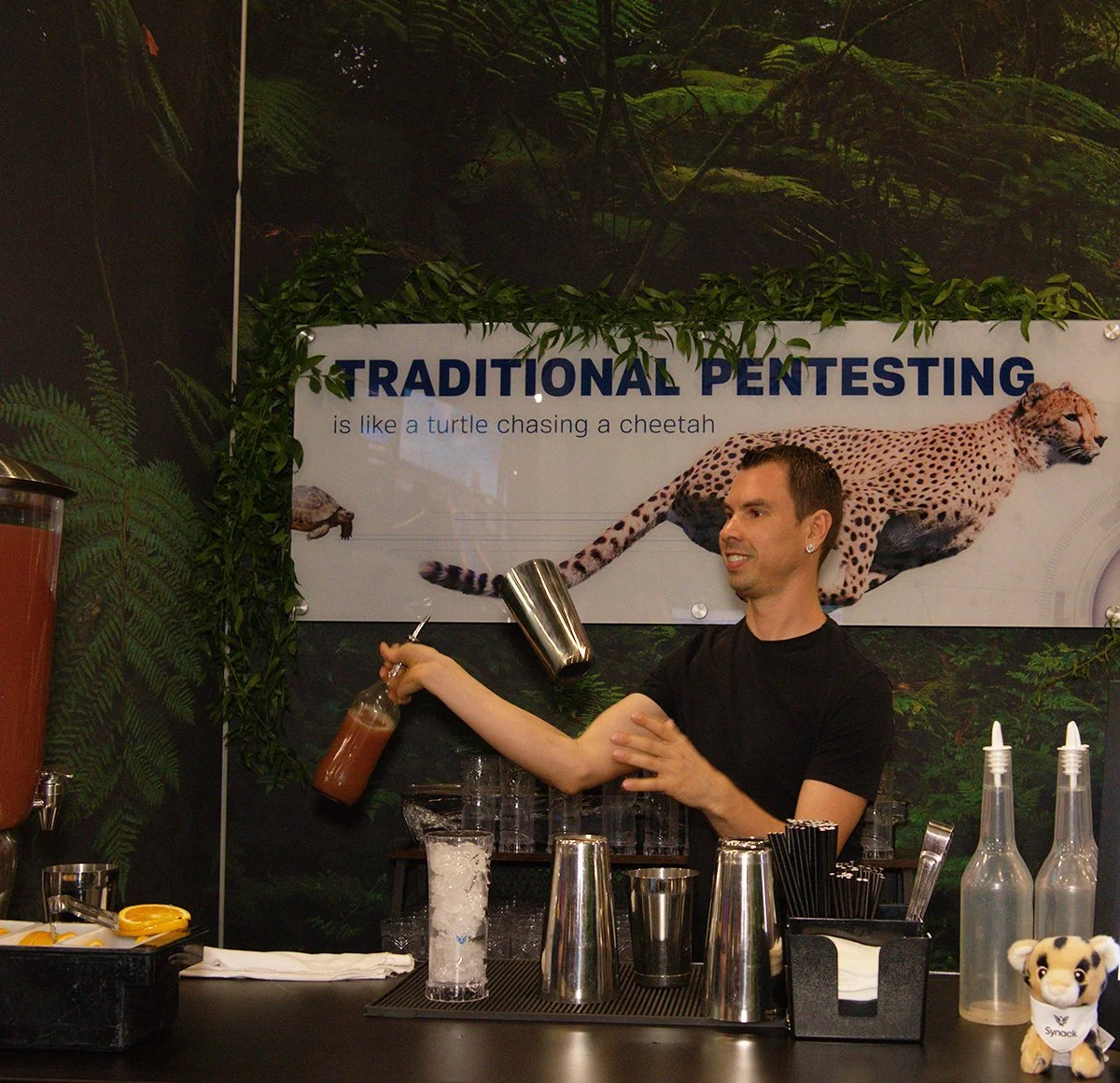 Users were entertained by a skillful bartender serving tropical cocktails in the afternoon.