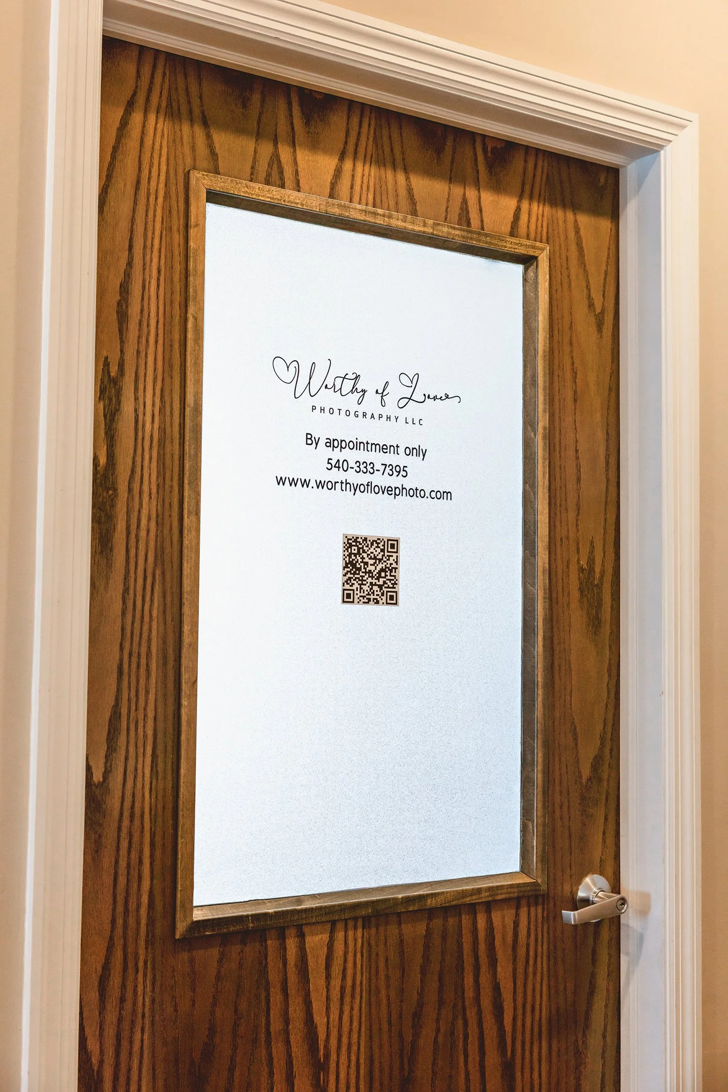 The door to the studio Worthy of Love Photography LLC in Front Royal, VA
