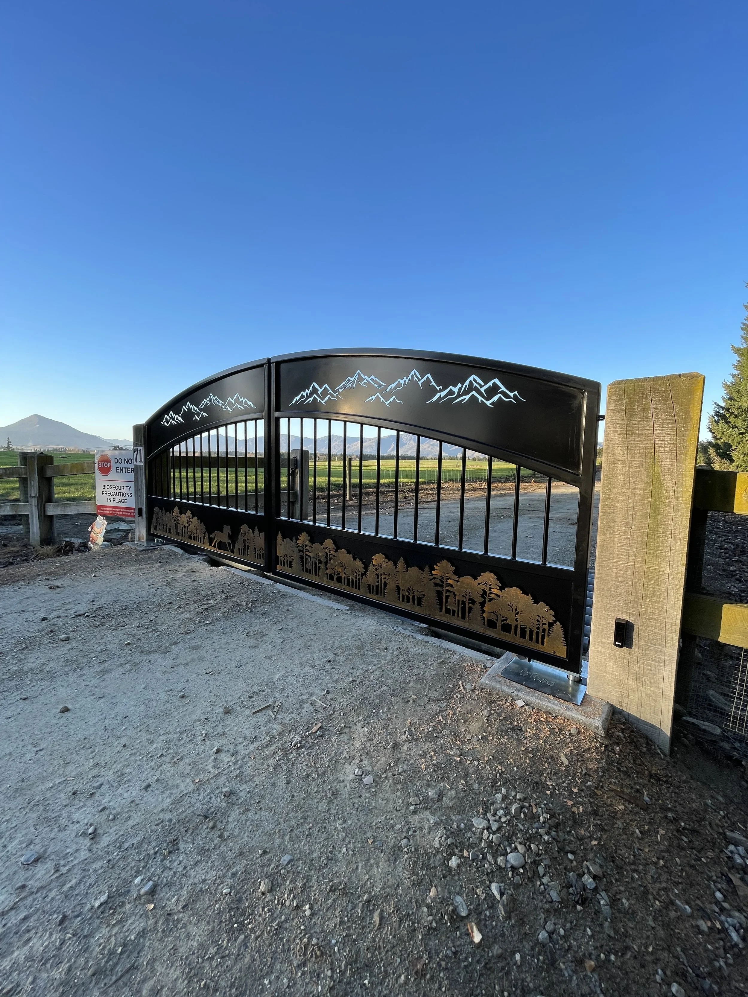 Designed and fabricated in house. One very happy customer on the completion of these gates 