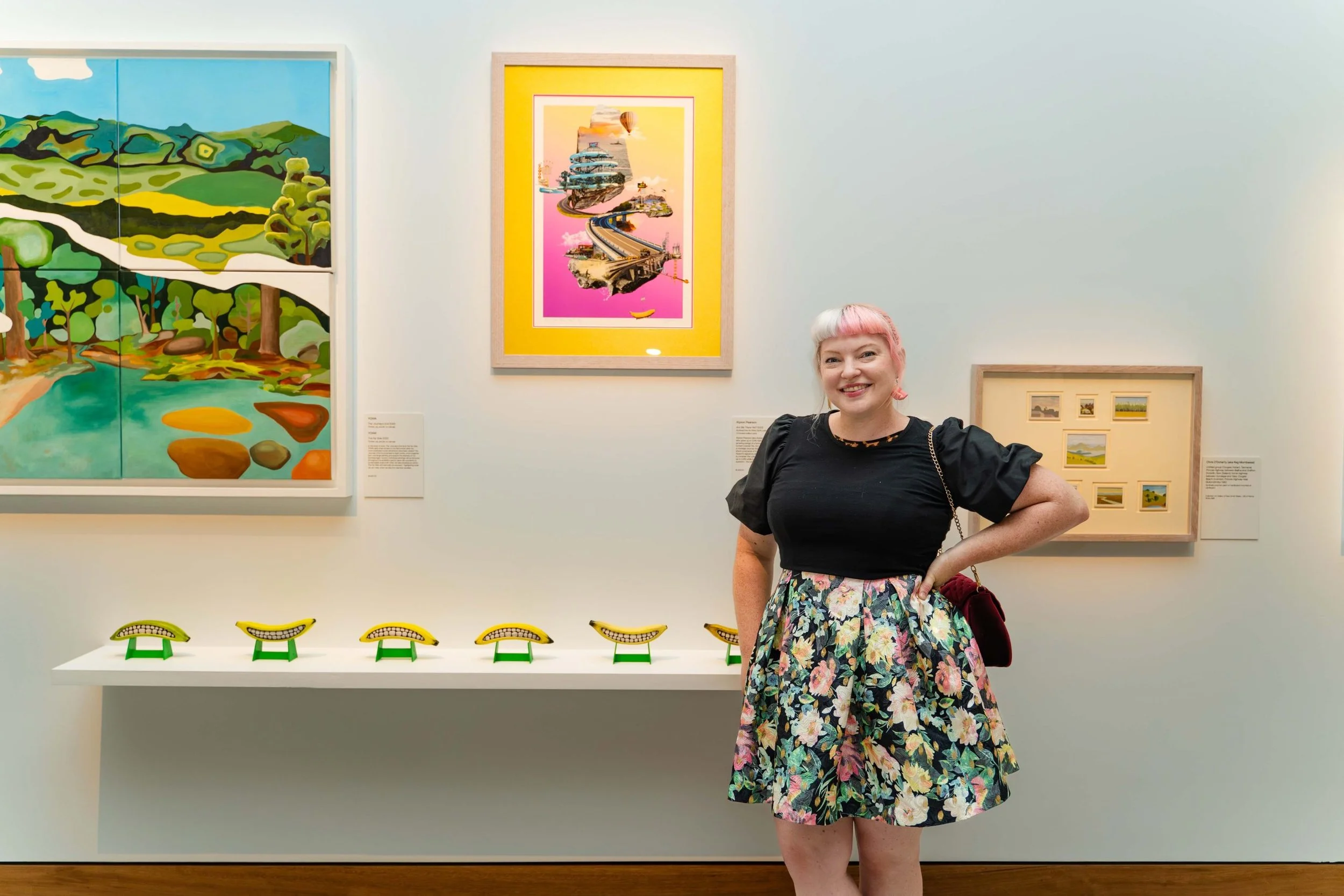 Alyson Pearson pictured with her artwork ‘Are We There Yet?’ 2023. Archival Fine Art Print, 100% cotton, 1/5 limited edition print. Image credit: And the Trees Photography.