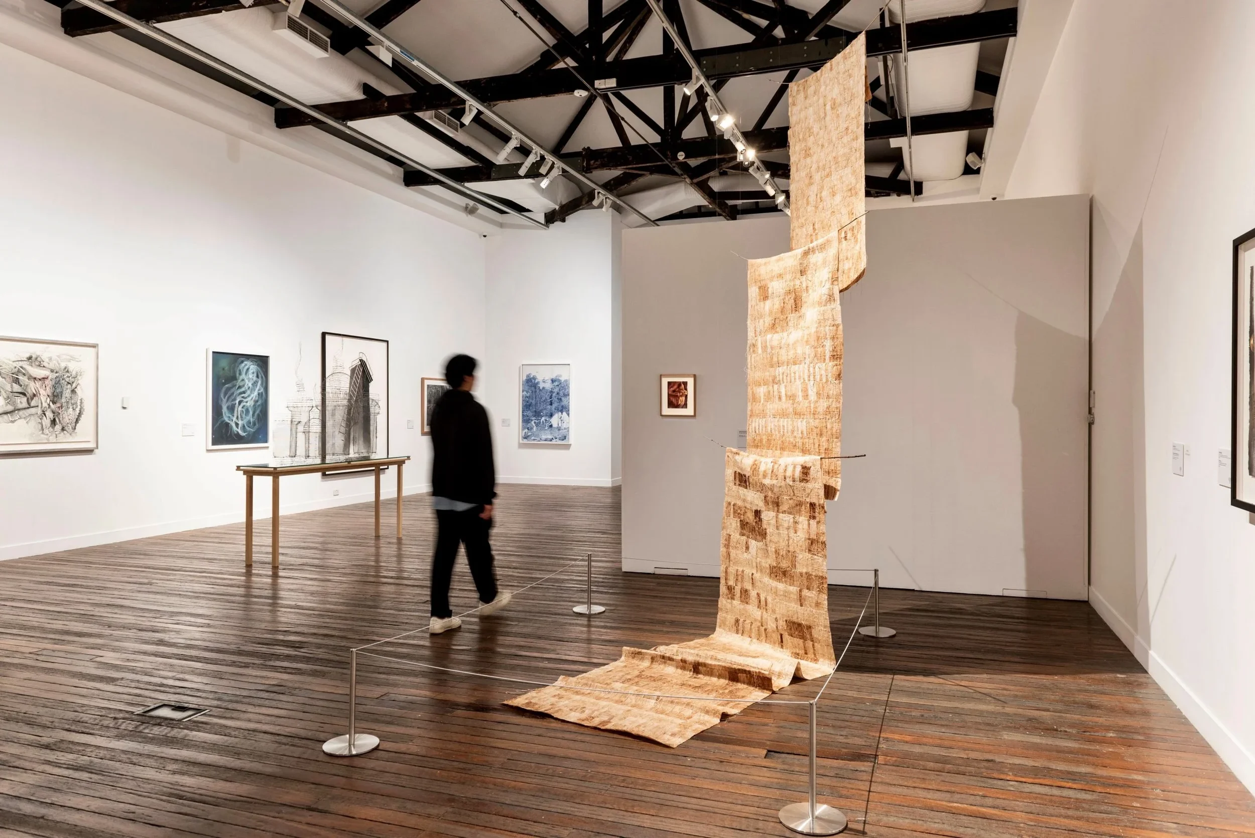 Jayanto Tan’s ‘The Waterfalls in the Moon Garden’ created from used teabags and tea stain. Installation view Dobell Drawing Prize 2023