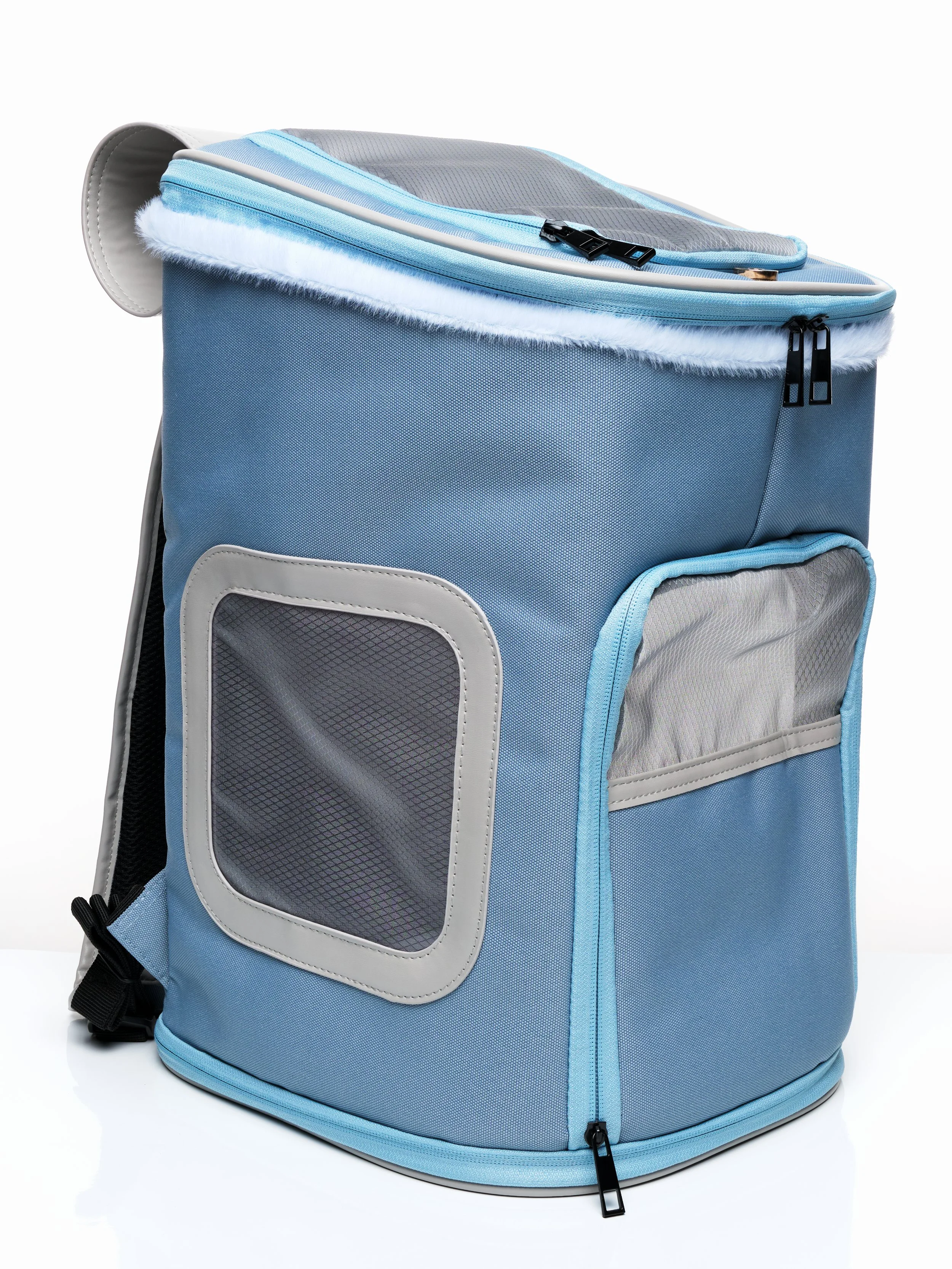Left angled view of the KibbleTime Sacre Bleu Backpack pet carrier.