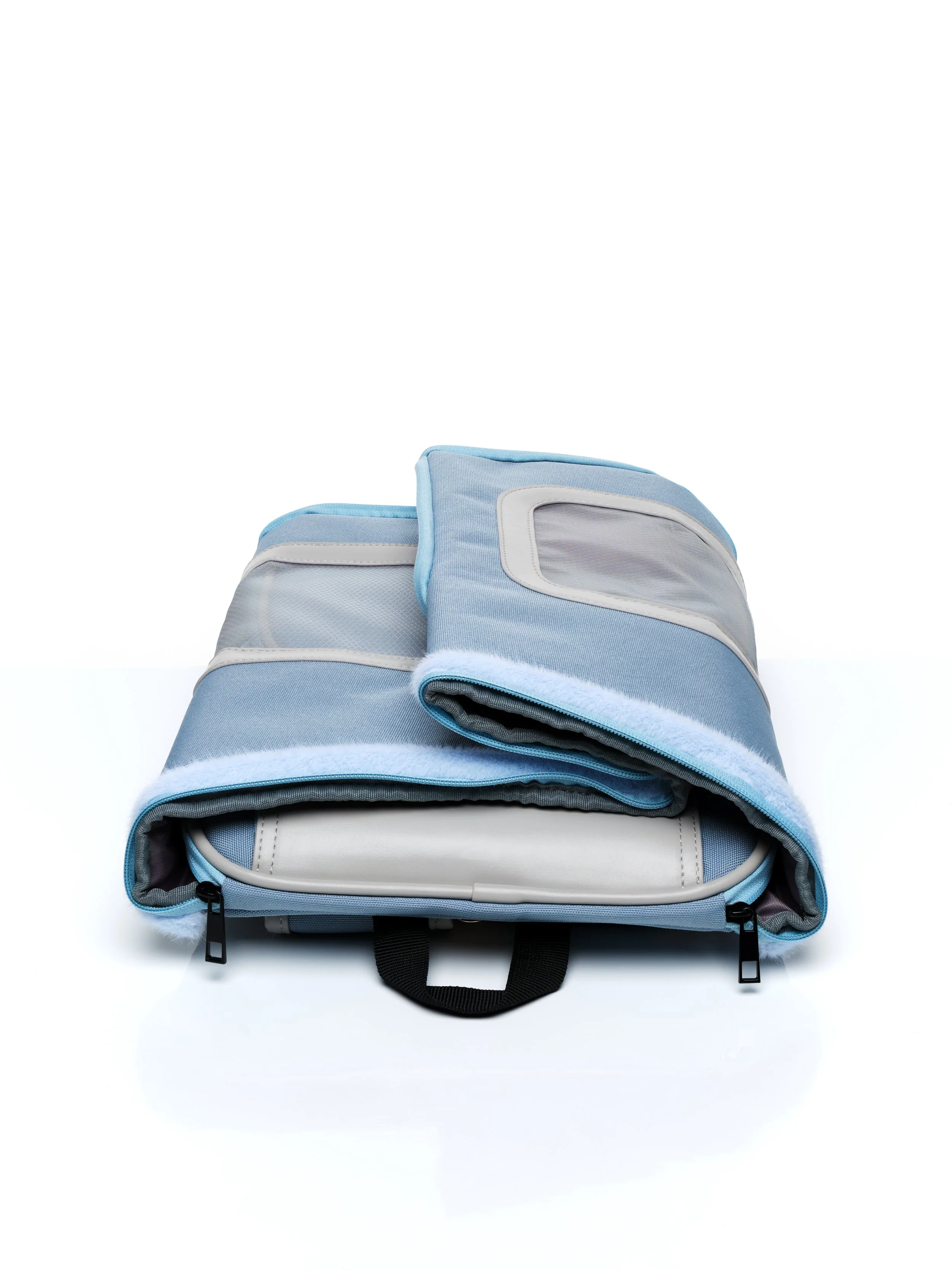 KibbleTime Sacre Bleu Backpack pet carrier collapsed down for storage.