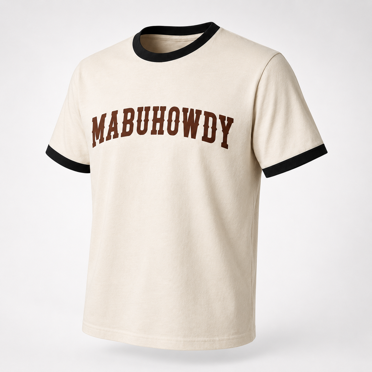Angled product view of the vintage cream MABUHOWDY™ Ringer Tee with black ringer trim and oxblood chest print.