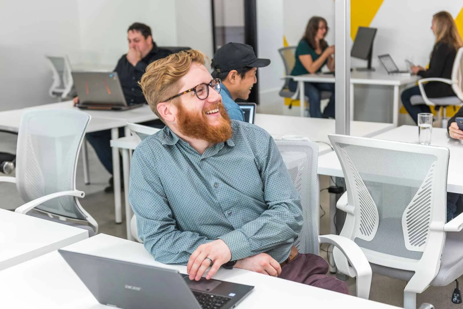 Entrepreneur working on laptop, Halifax business branding photography