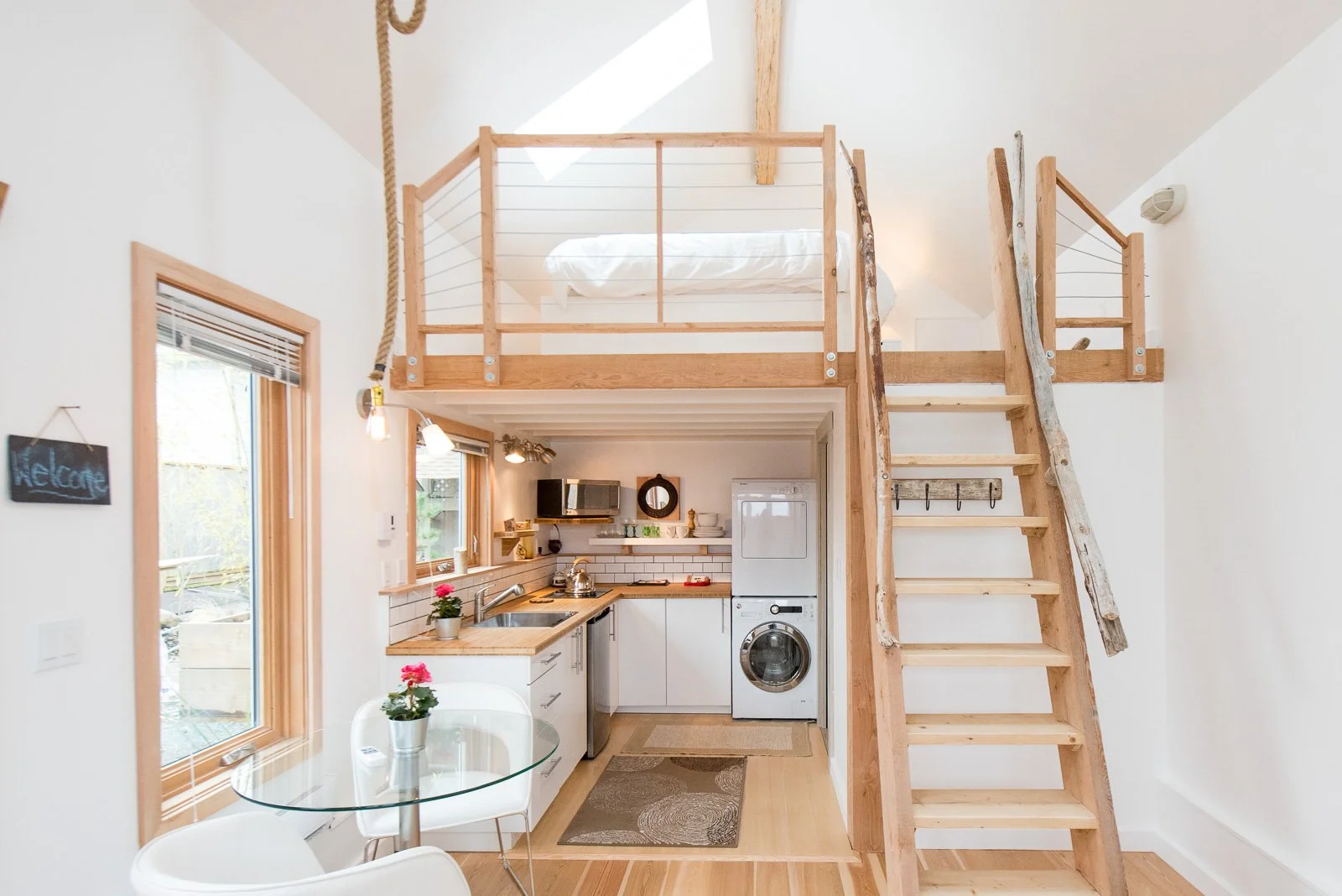 Loft interior with wood staircase and natural light, real estate photographer South Shore
