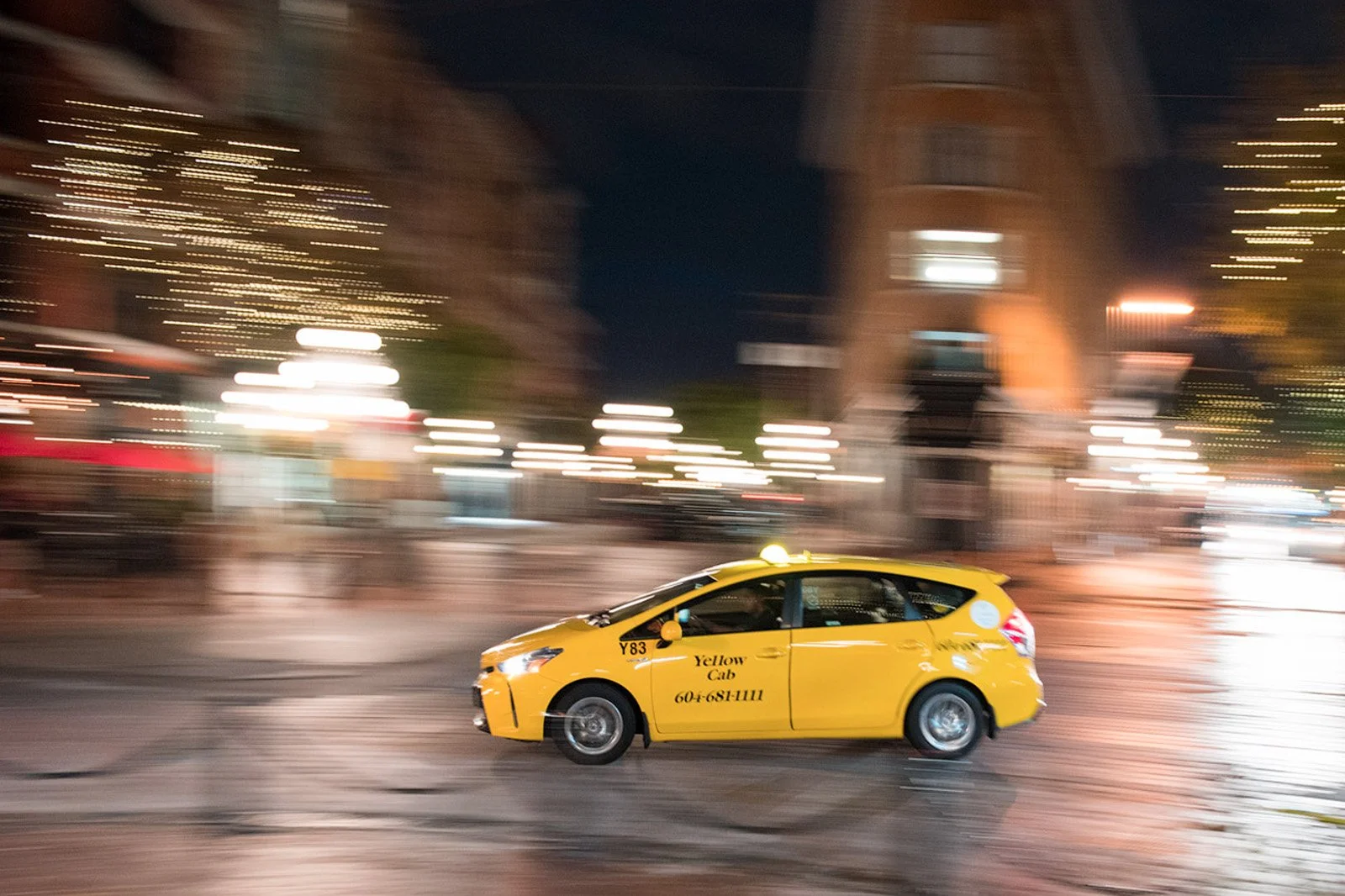 Yellow taxi motion blur photo - photography classes nova scotia