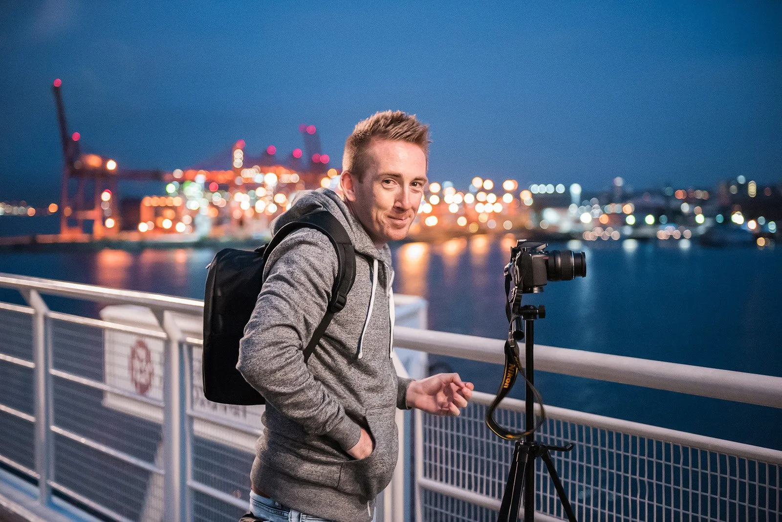 Student setting up tripod for night photo - private photography tutor nova scotia