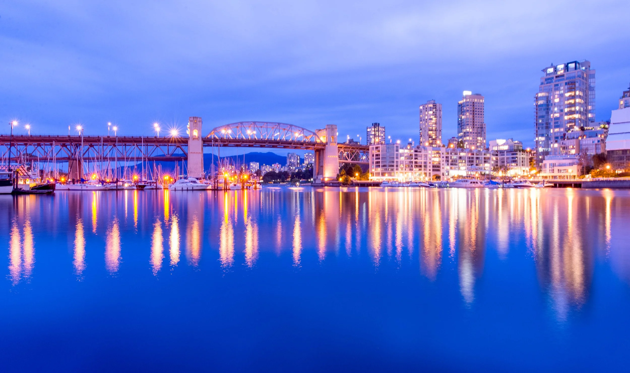 Vancouver night skyline with Burrard Bridge captured in long exposure during photo workshop