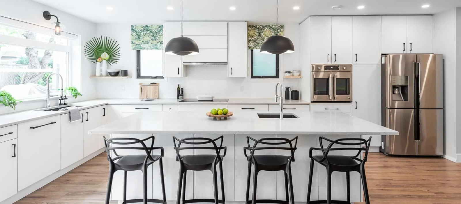 White modern kitchen with pendant lights, interior photographer South Shore