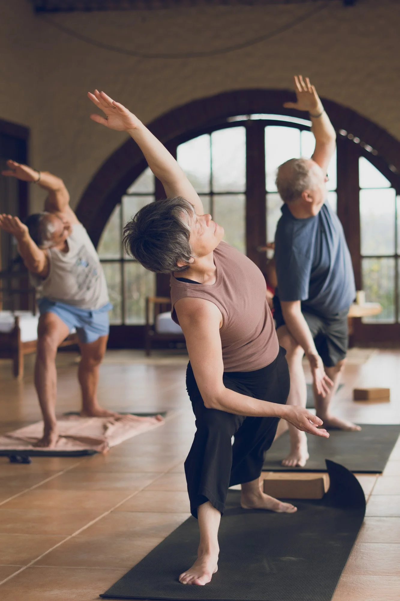 Group yoga class in retreat studio, yoga retreat photographer Nova Scotia