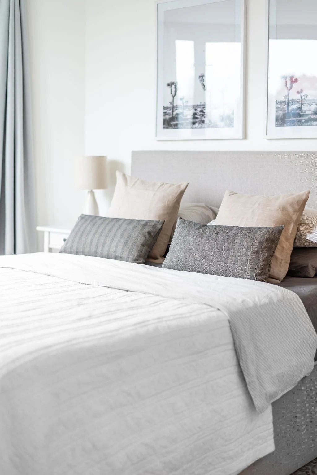 Bedroom with grey linens, interior photographer Halifax