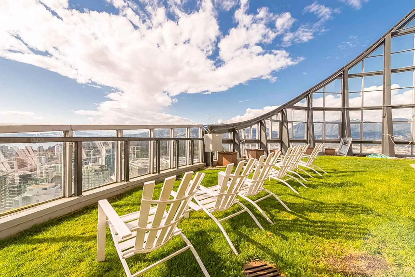 Rooftop patio with deck chairs, architecture photography Vancouver