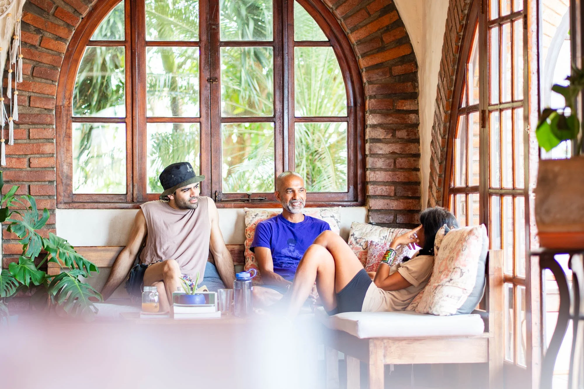 Retreat guests relaxing in lounge space, wellness retreat photography