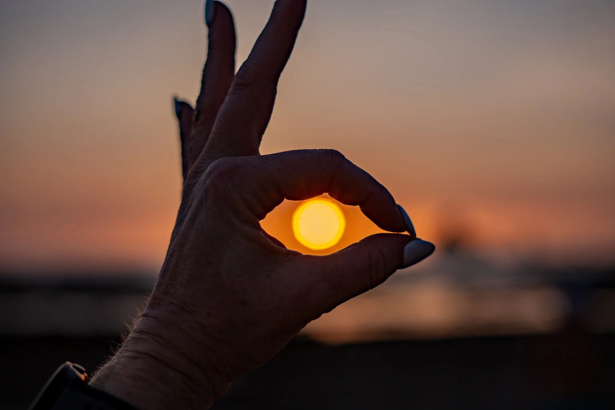 Hand framing sunset at retreat, retreat photography South Shore, Nova Scotia