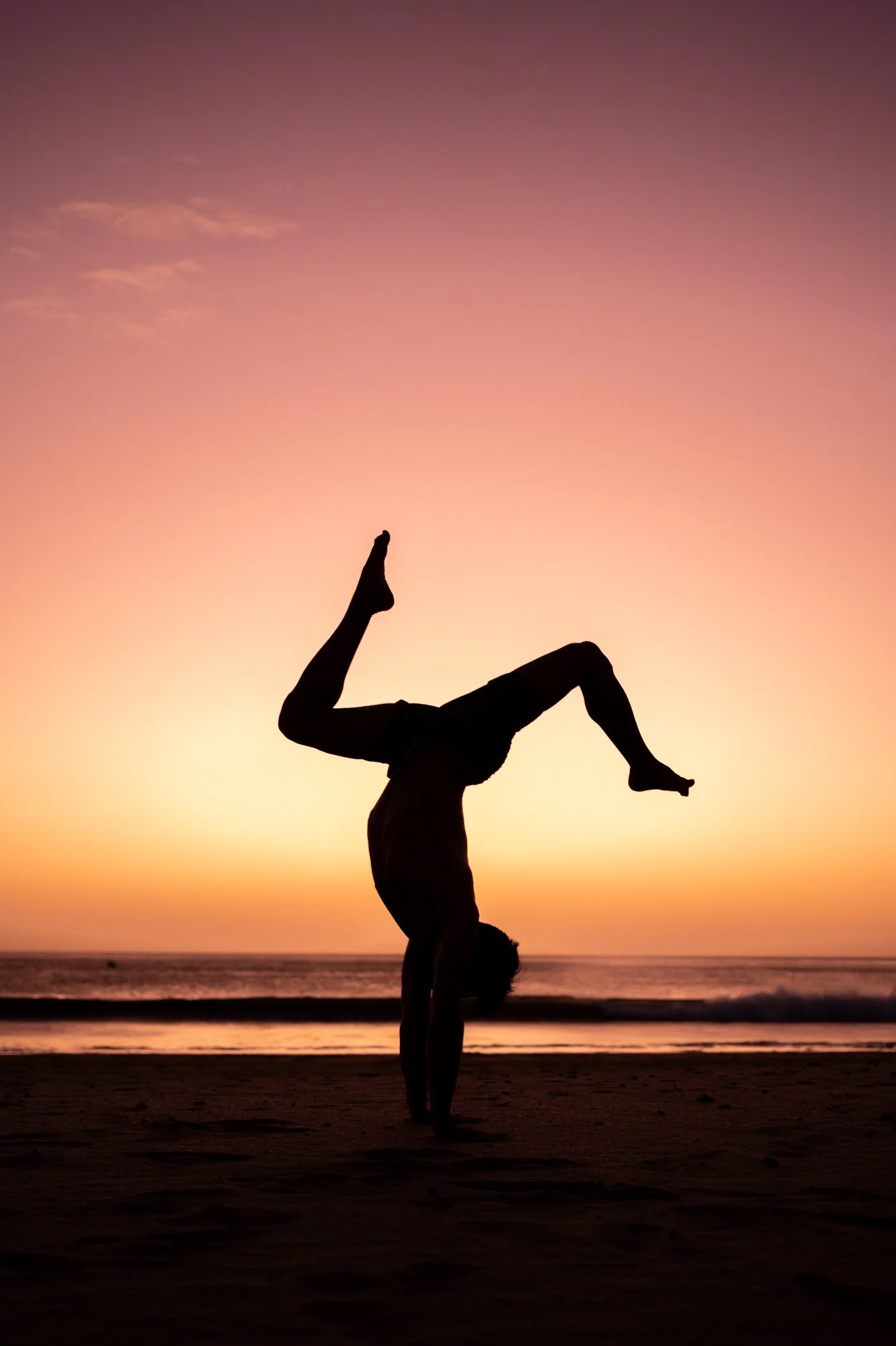 Sunset yoga pose on beach, yoga retreat photographer Nova Scotia