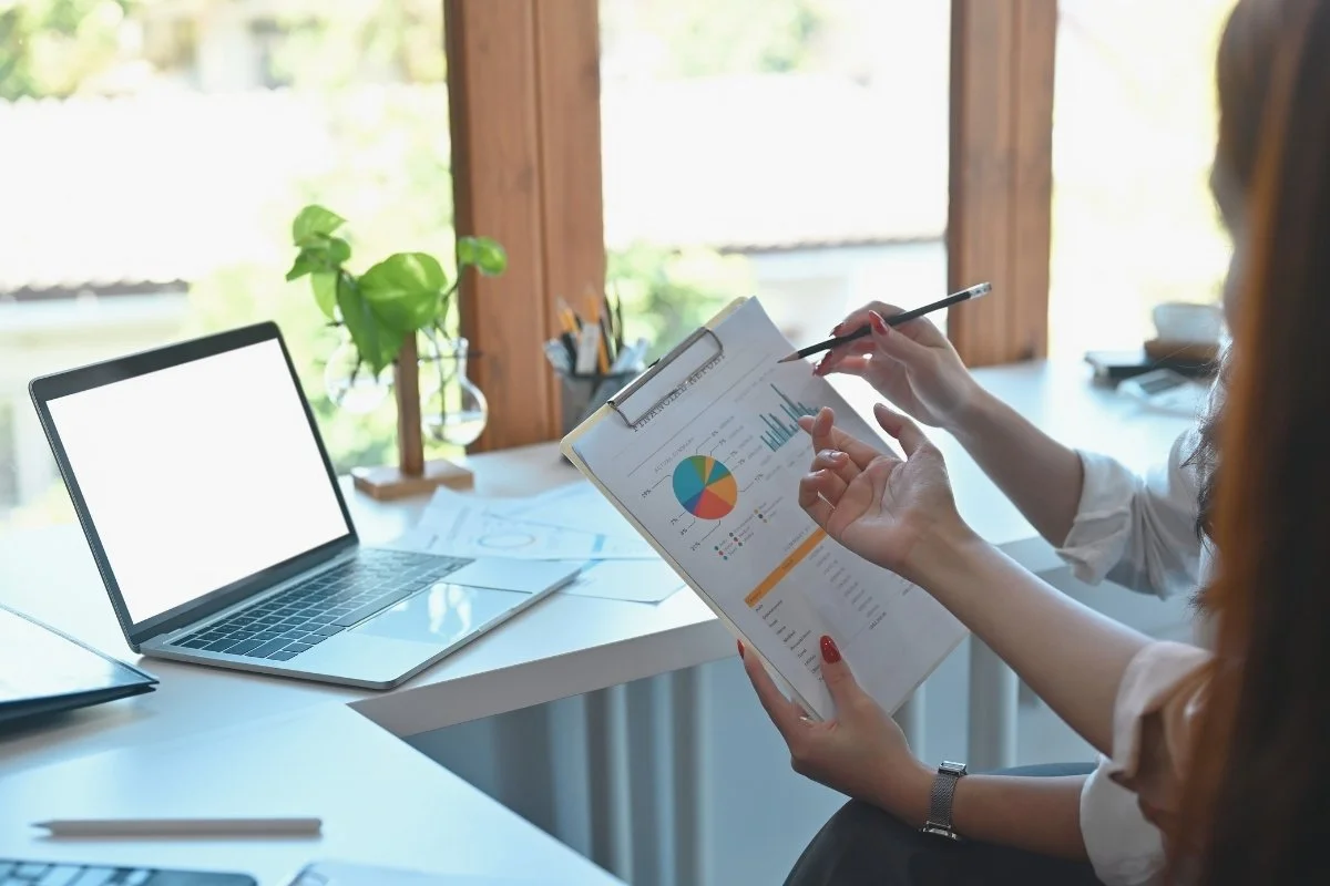 Reviewing Social Media reports with charts and graphs.