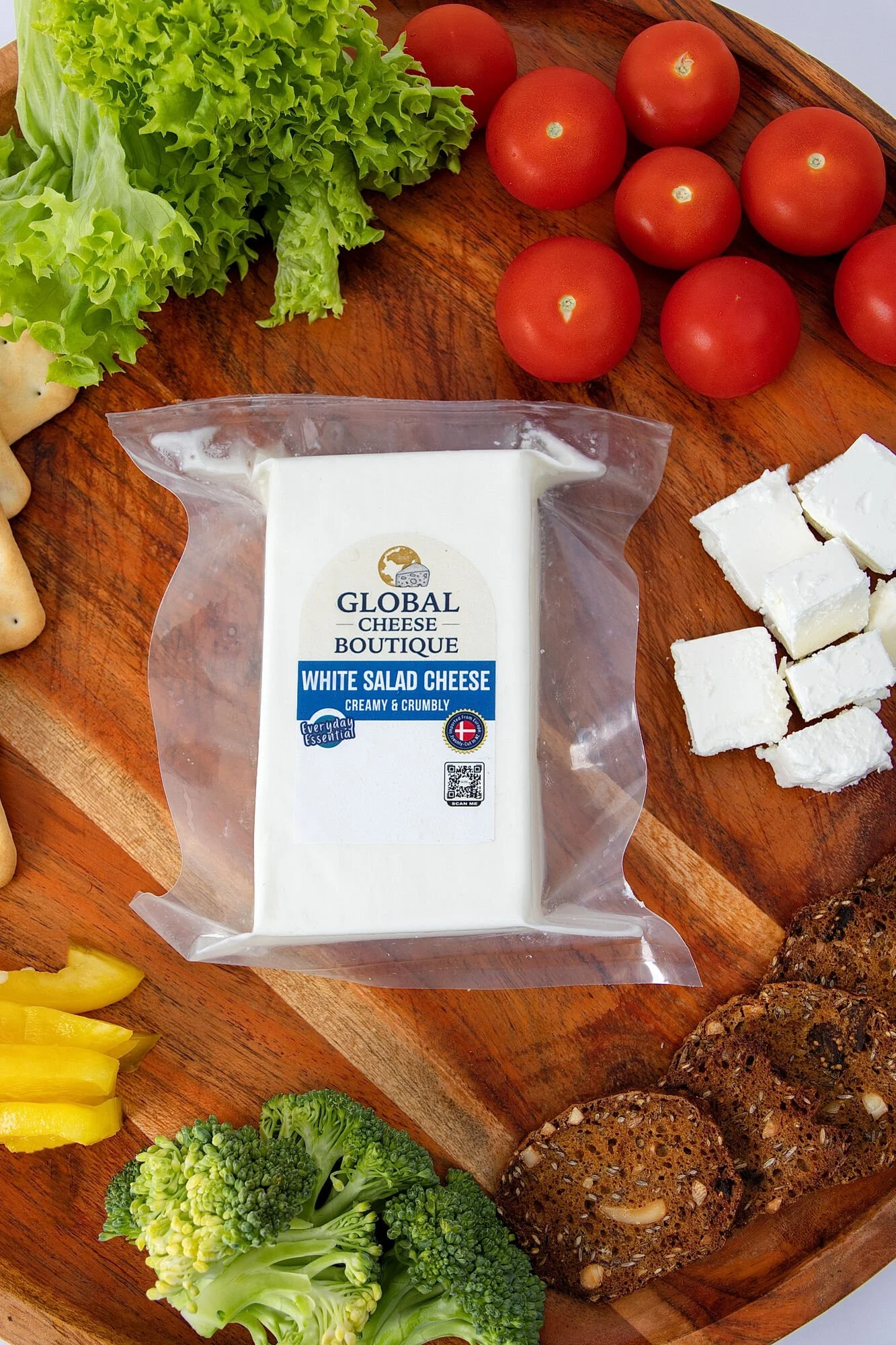 White Salad Cheese 230 g from above with cheese cubes, lettuce, cherry tomatoes and broccoli