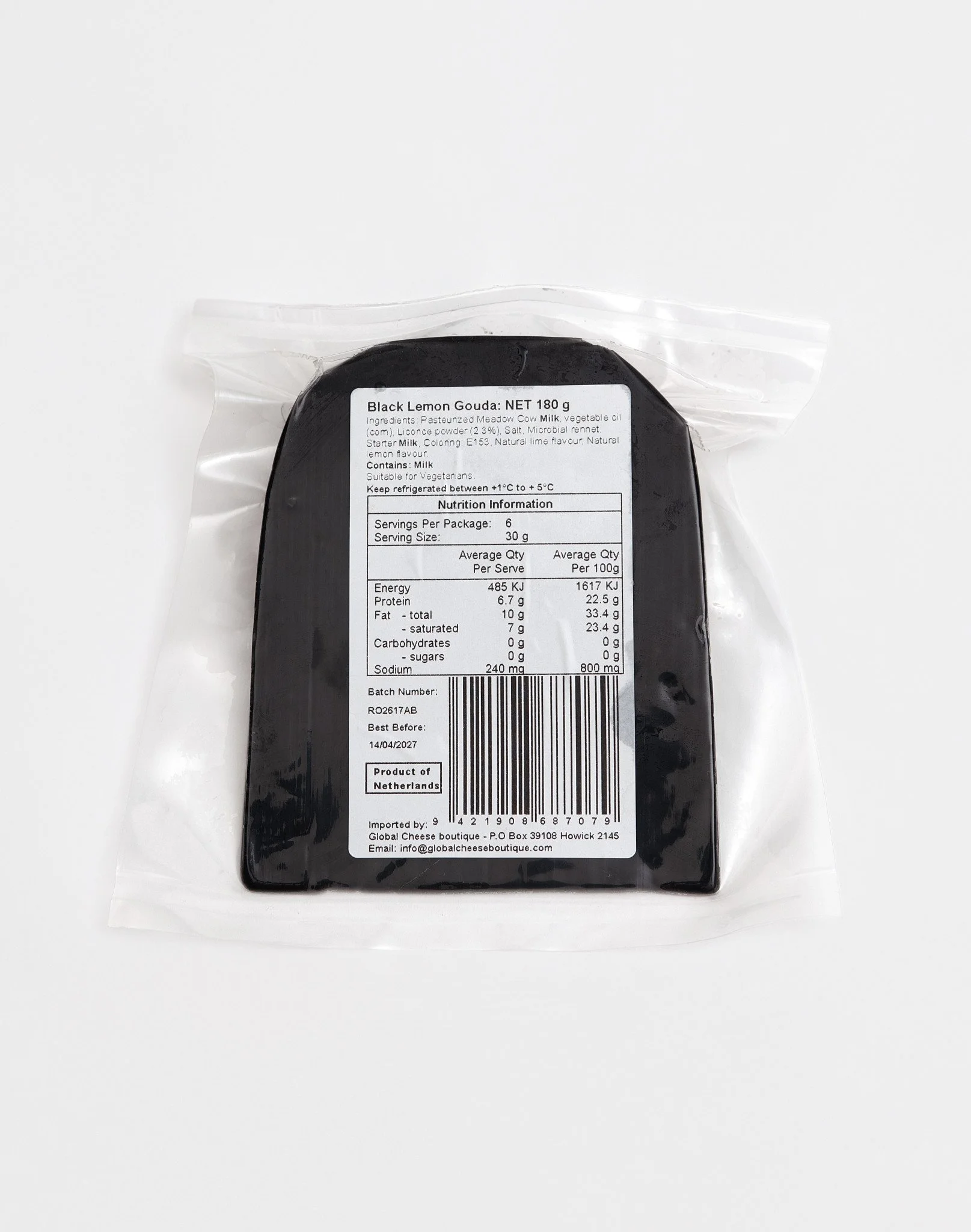 Black Lemon Gouda 180 g, back of sealed pack showing the information label and barcode