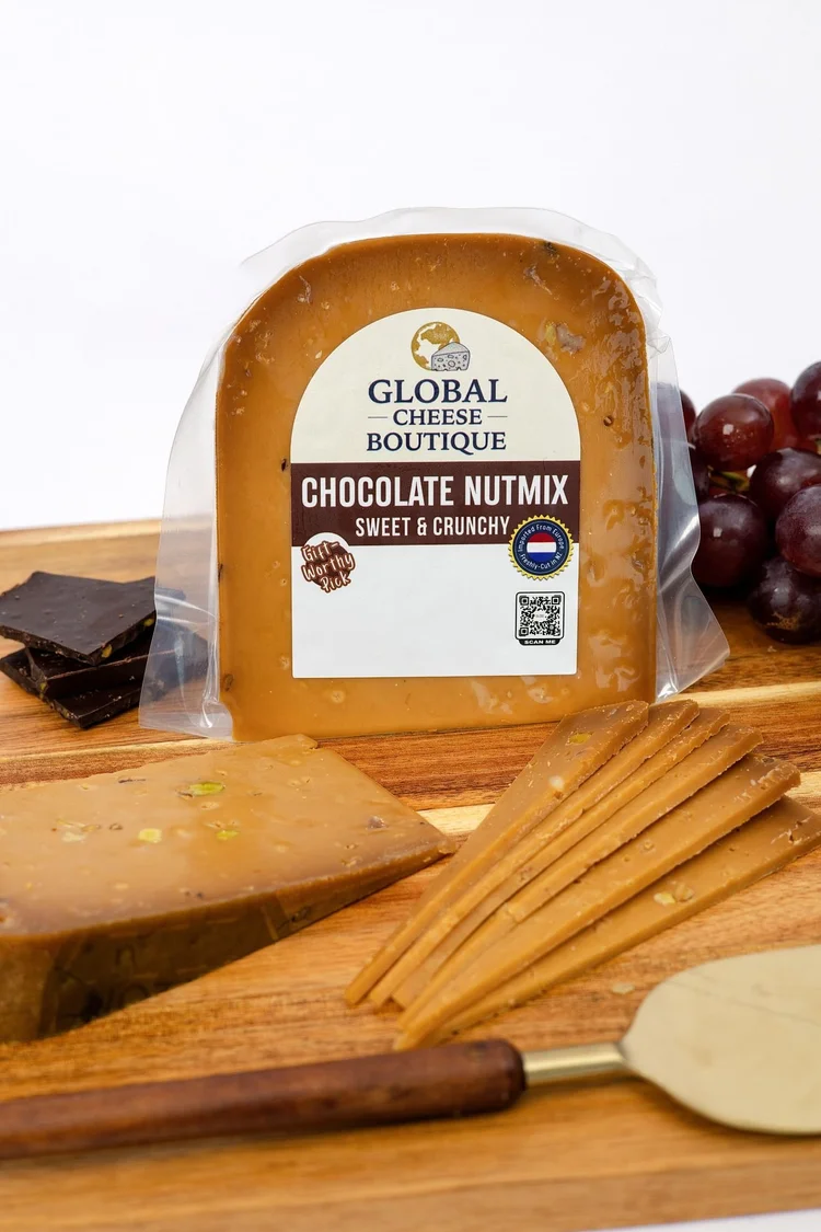 Chocolate Nutmix Gouda 180 g, sealed pack with a wedge and slices on a board