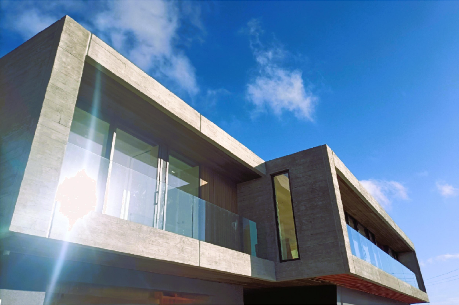 A frameless Glass Balustrade featured on a modern architectural home.